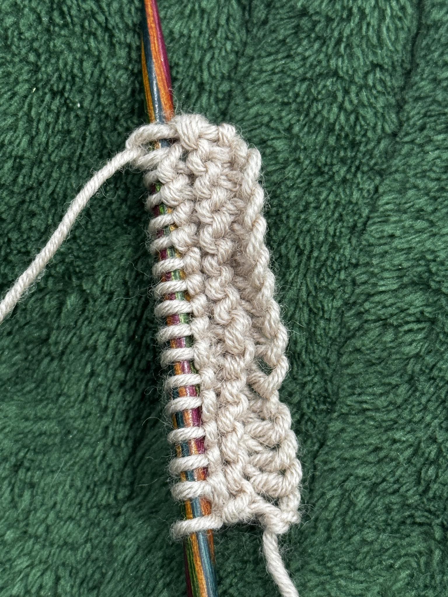 Why do I get an awkward first loop when starting a knit stitch?