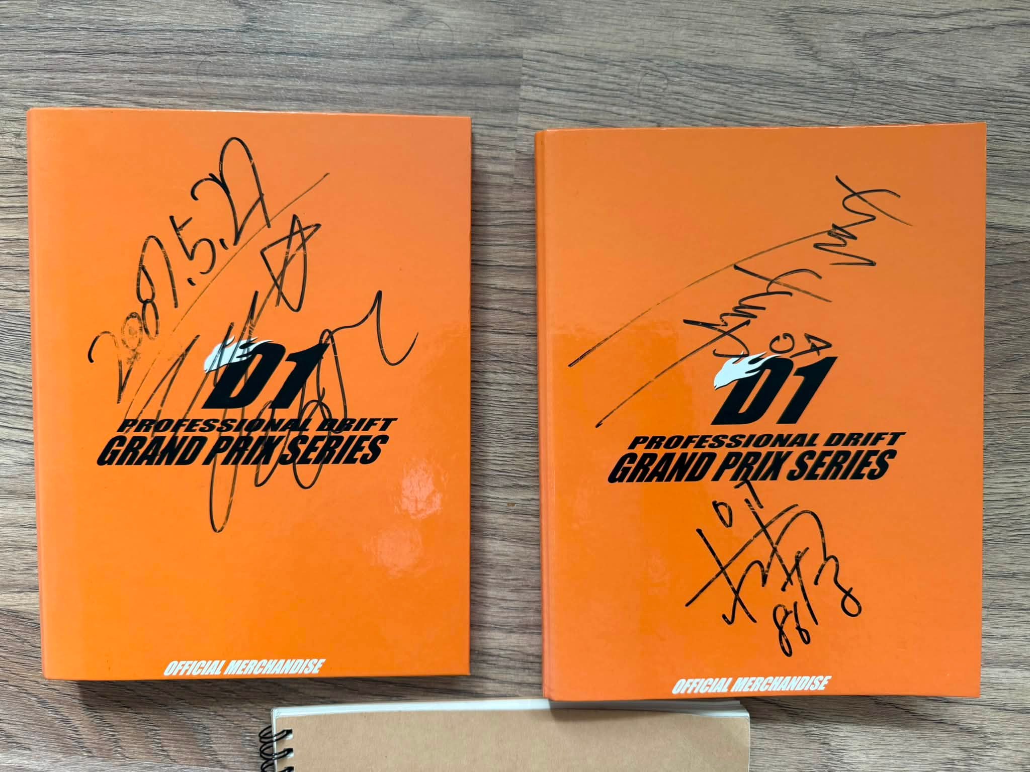 D1GP autograph collection with drift drivers