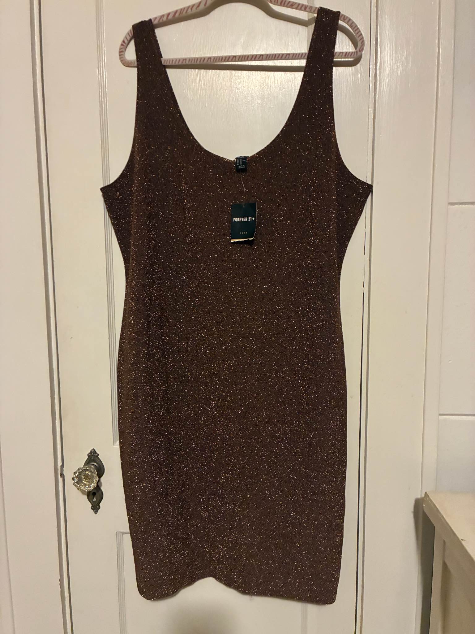 rose gold sequin dress forever 21 New Plus size 3X knit is with a metallic shimmer. This sleeveless garment has a scoop neckline and a tulip-style hem Evening gown