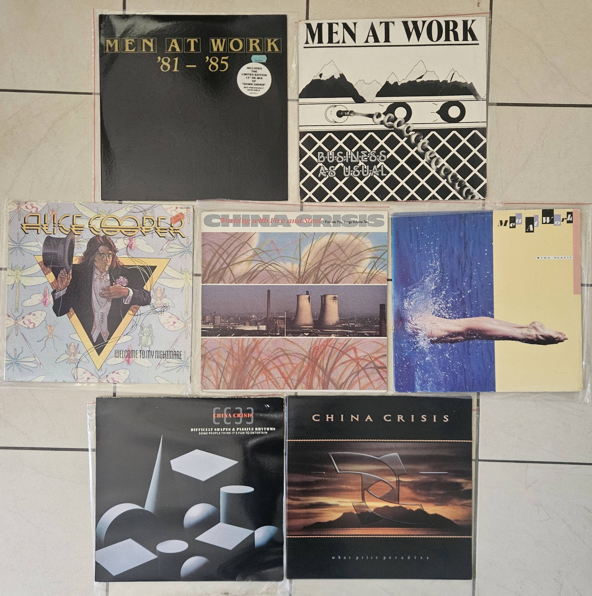 Men at Work, China Crisis, and Alice Cooper vinyl records for sale
