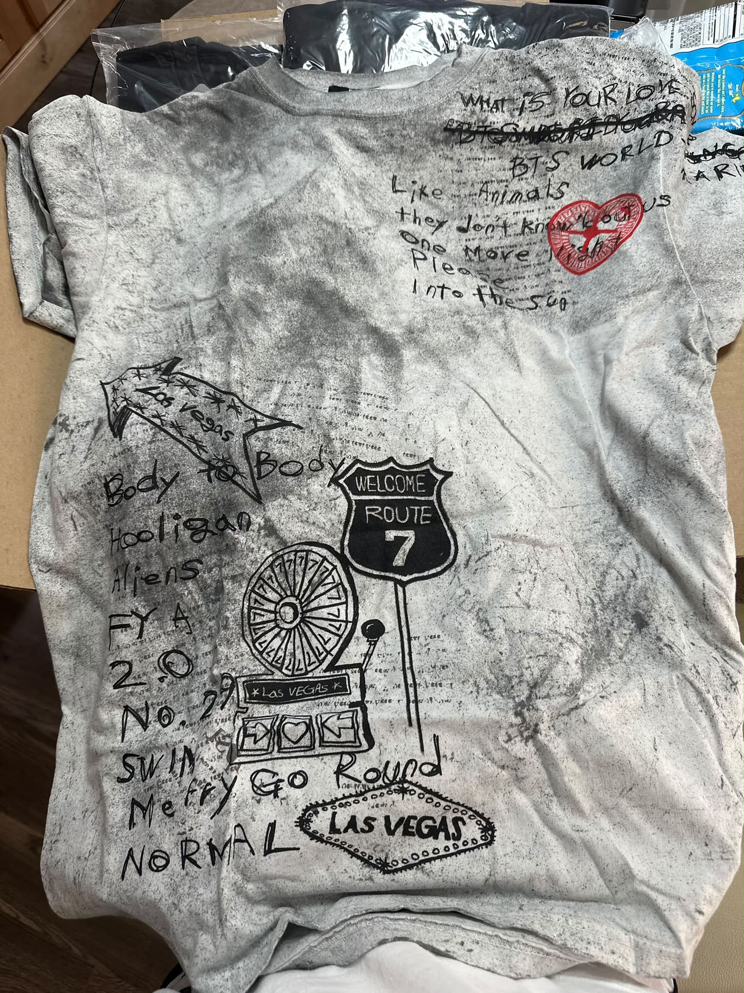 Looking for someone to buy BTS grey shirt at Las Vegas pop-up event