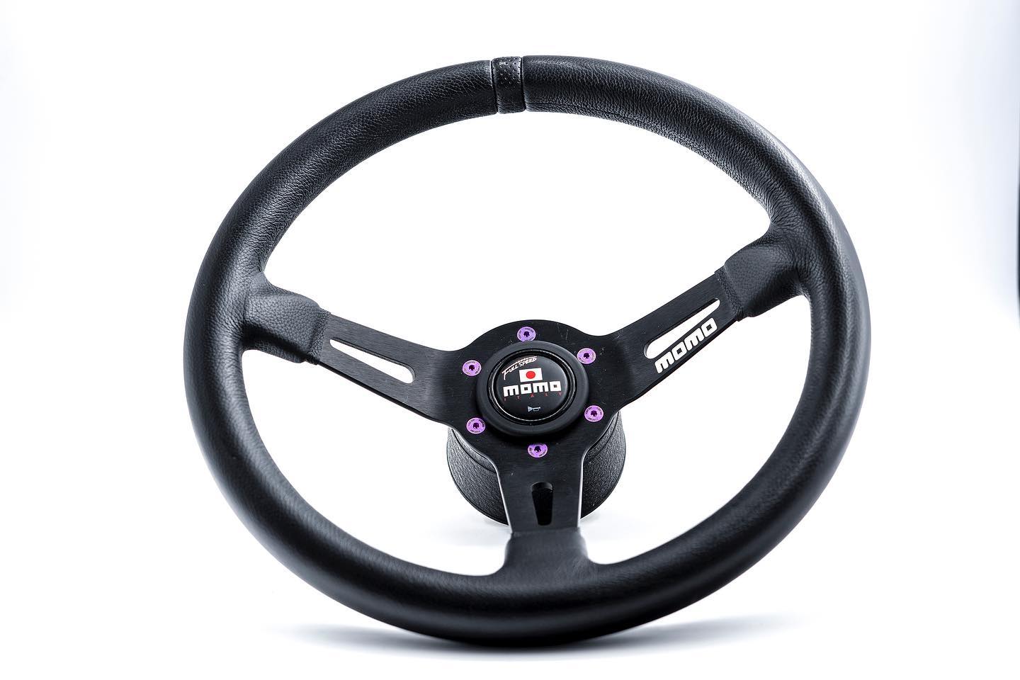 Our new Slasher Edition steering wheel in black suede with gold