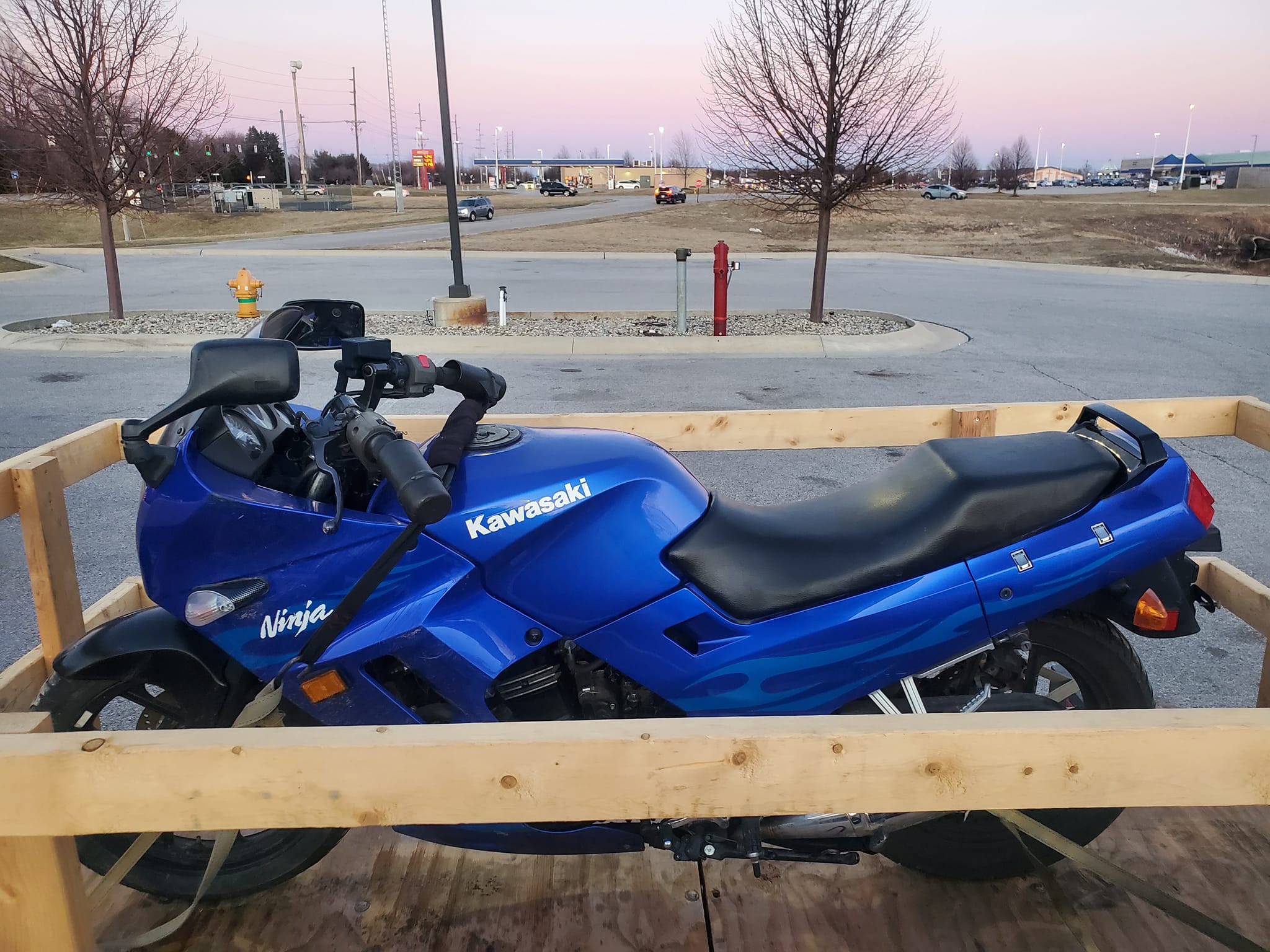 What are the effects of installing pod filters on a Kawasaki Ninja