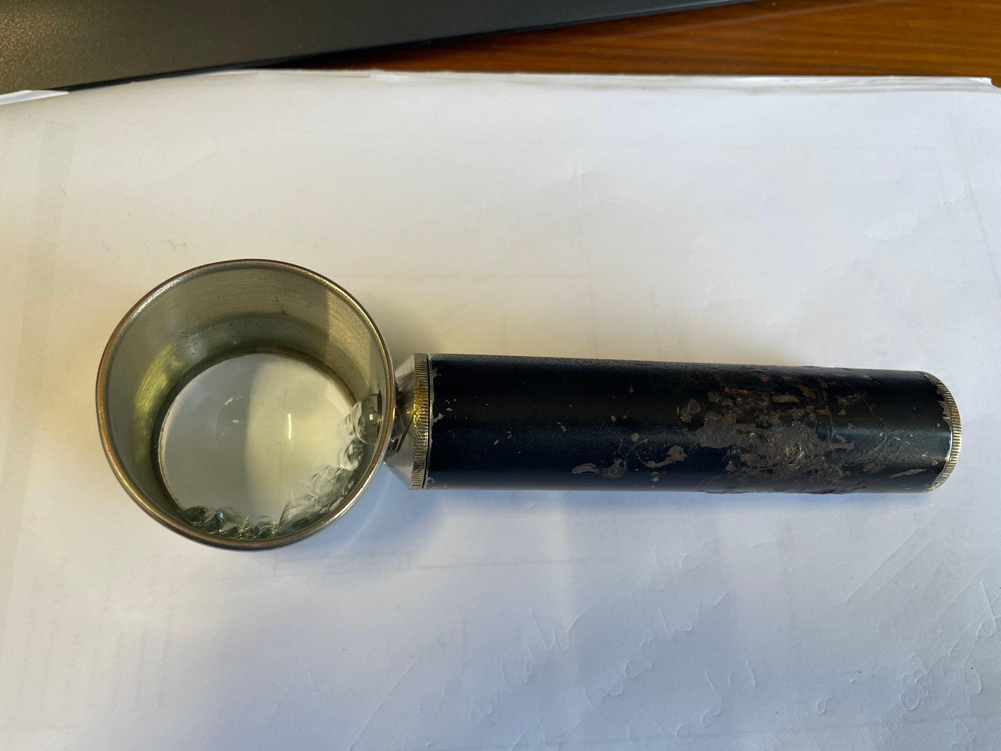 What brand is this vintage magnifying glass with a light?
