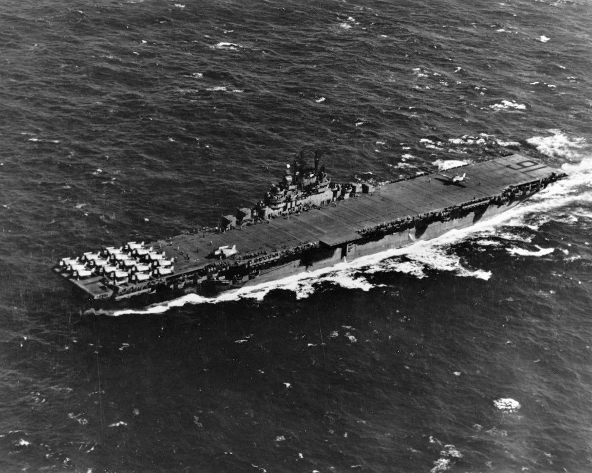 USS Lexington (CV 16) pictured underway recovering aircraft on