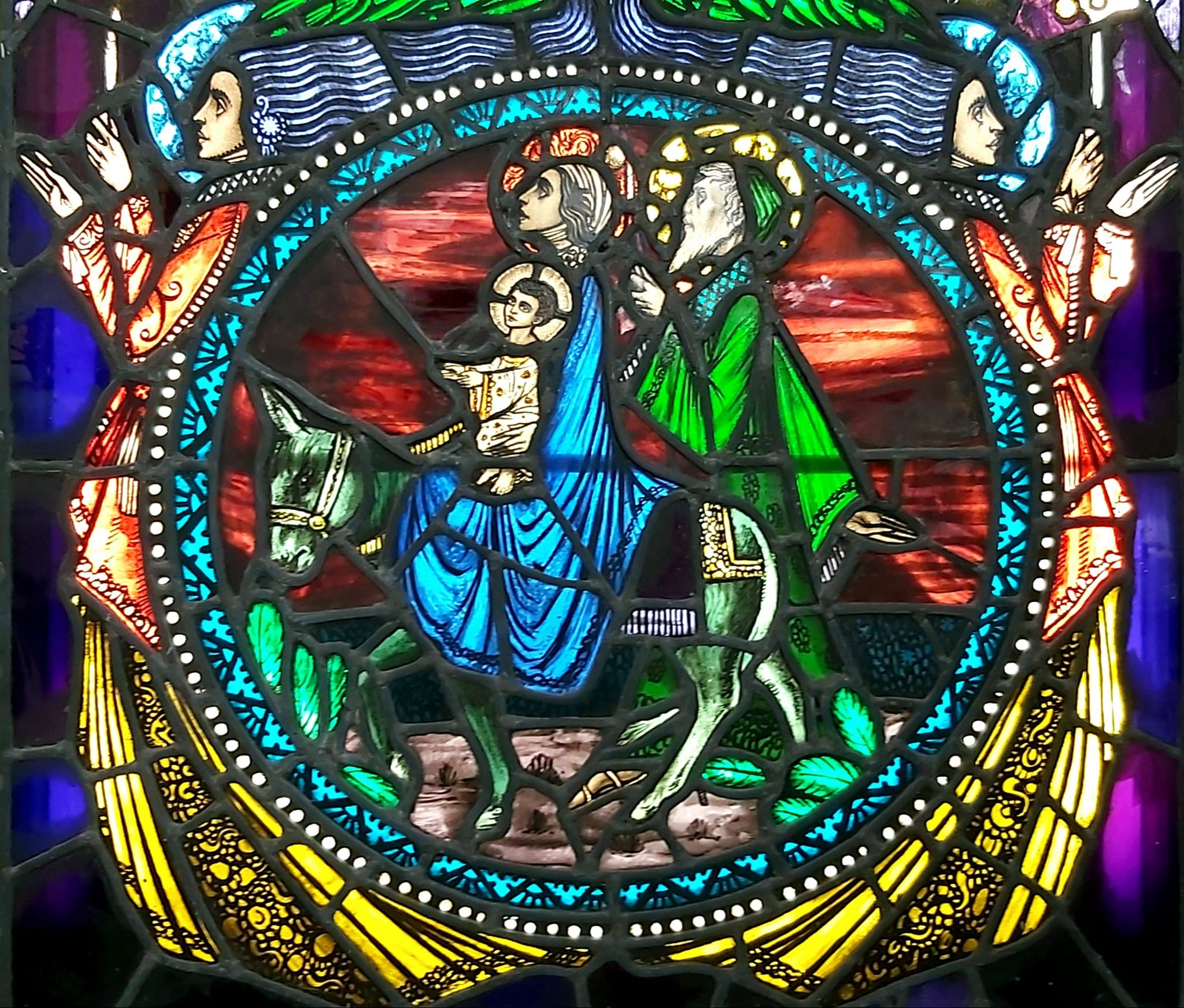 St Joseph Church's stained glass window of the Flight into Egypt