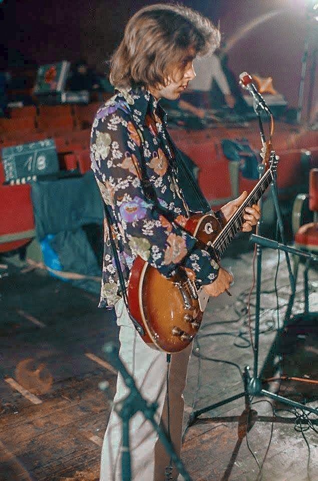 Mick Taylor playing cherry red early-1960s Gibson SG Standard