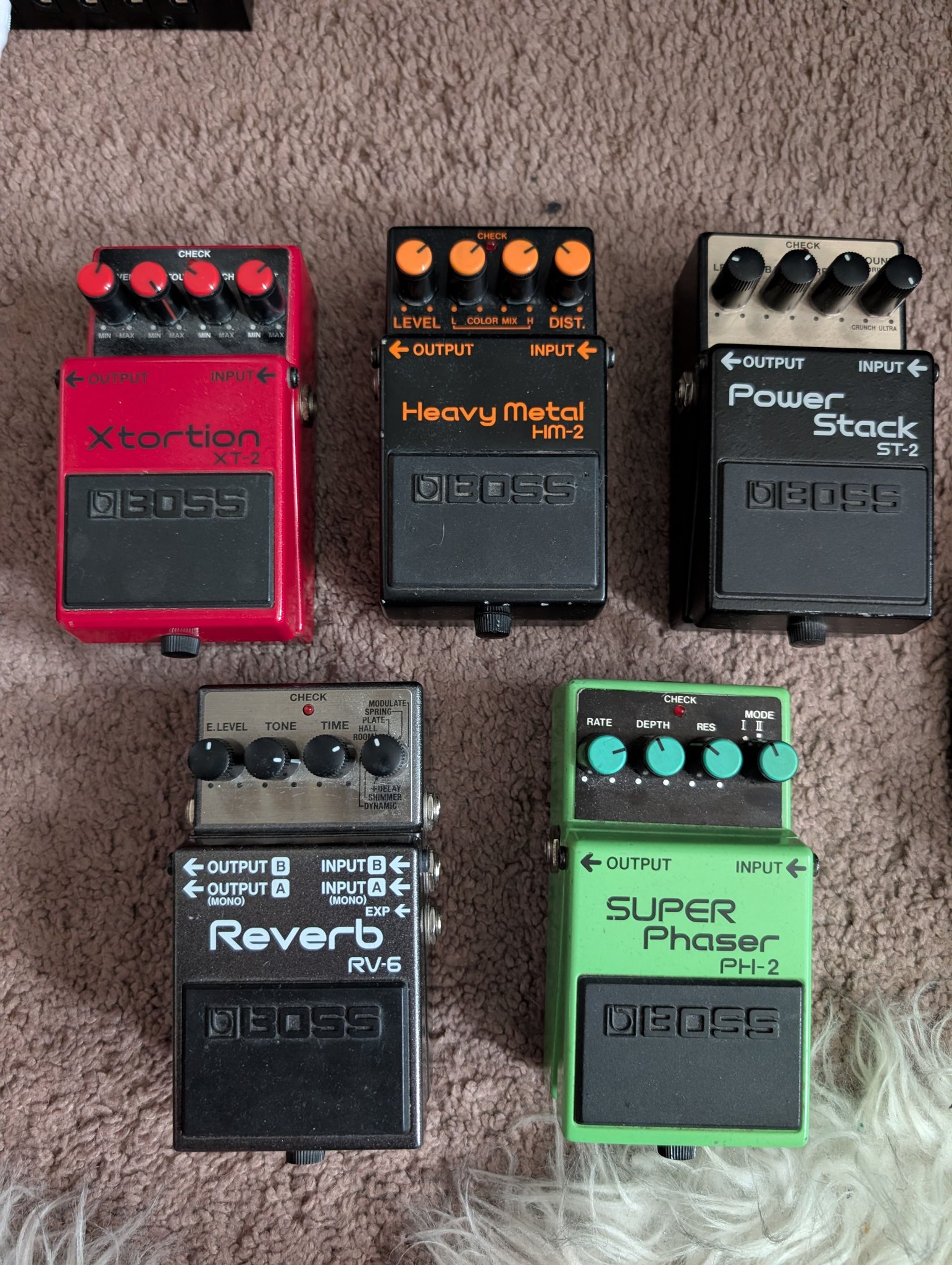 Vintage pedal collection including Boss CS-2 and EHX Black Finger