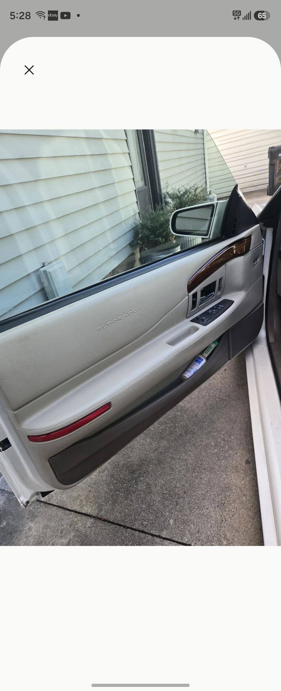 Custom Cadillac Eldorado door panel update with stereo installation