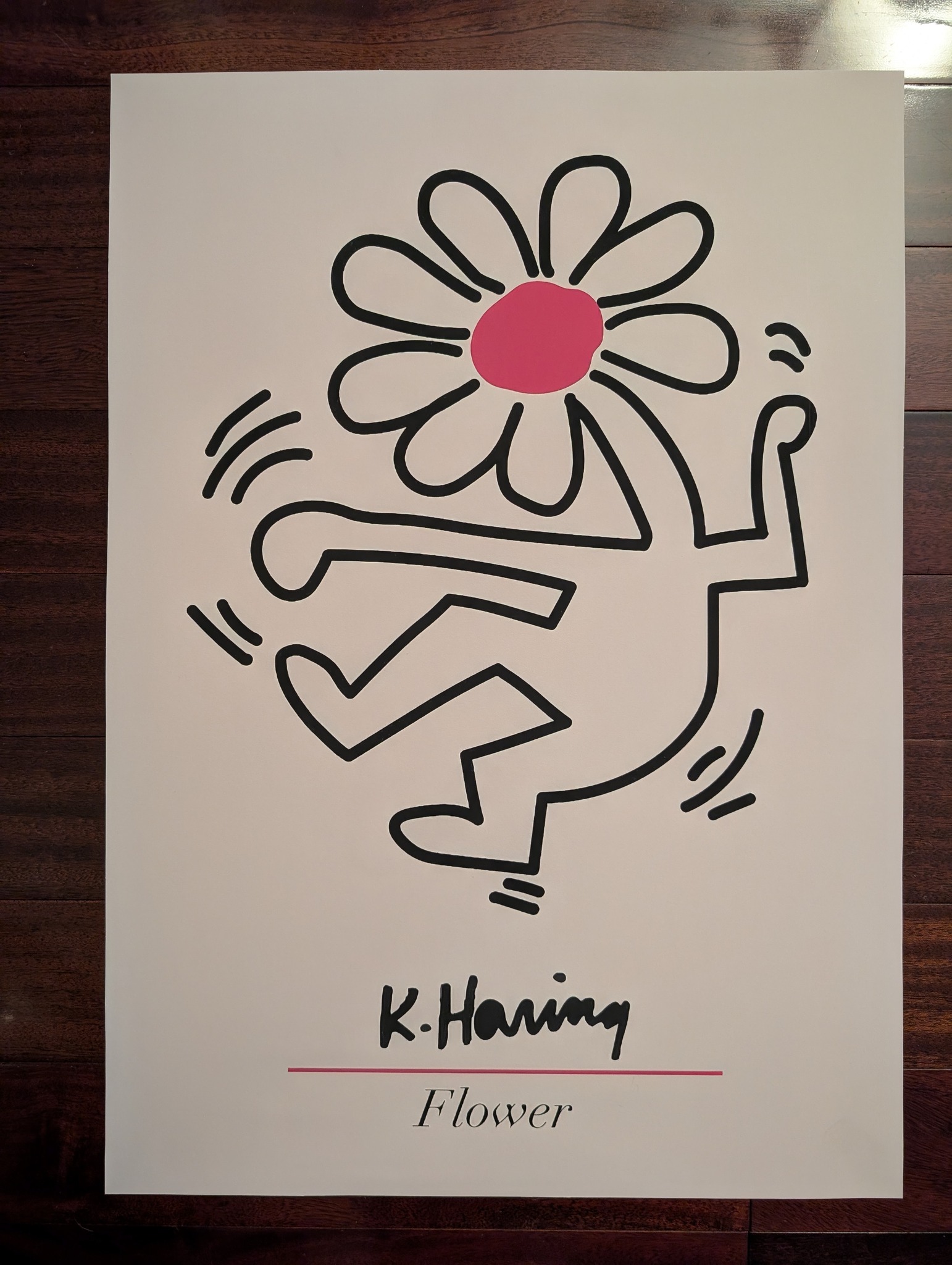 Keith Haring autographed catalog with custom drawing