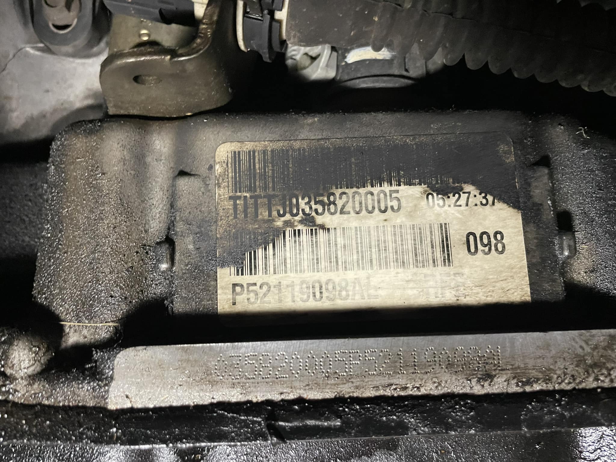 Who can change transmission fluid in a Dodge Ram 1500 5.7 and what's the price