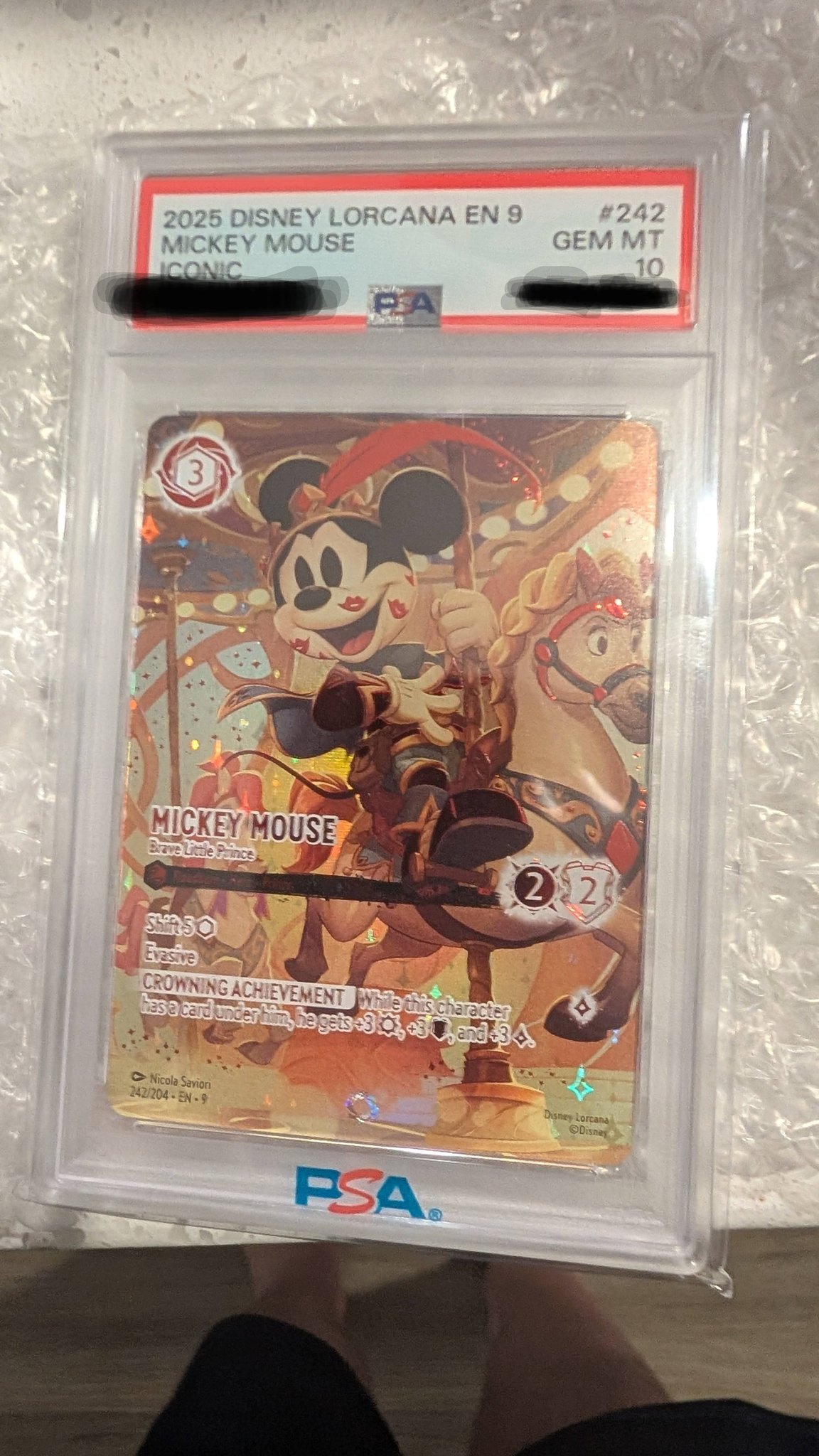Disney Lorcana iconic card collection with Mickey Mouse in PSA 10