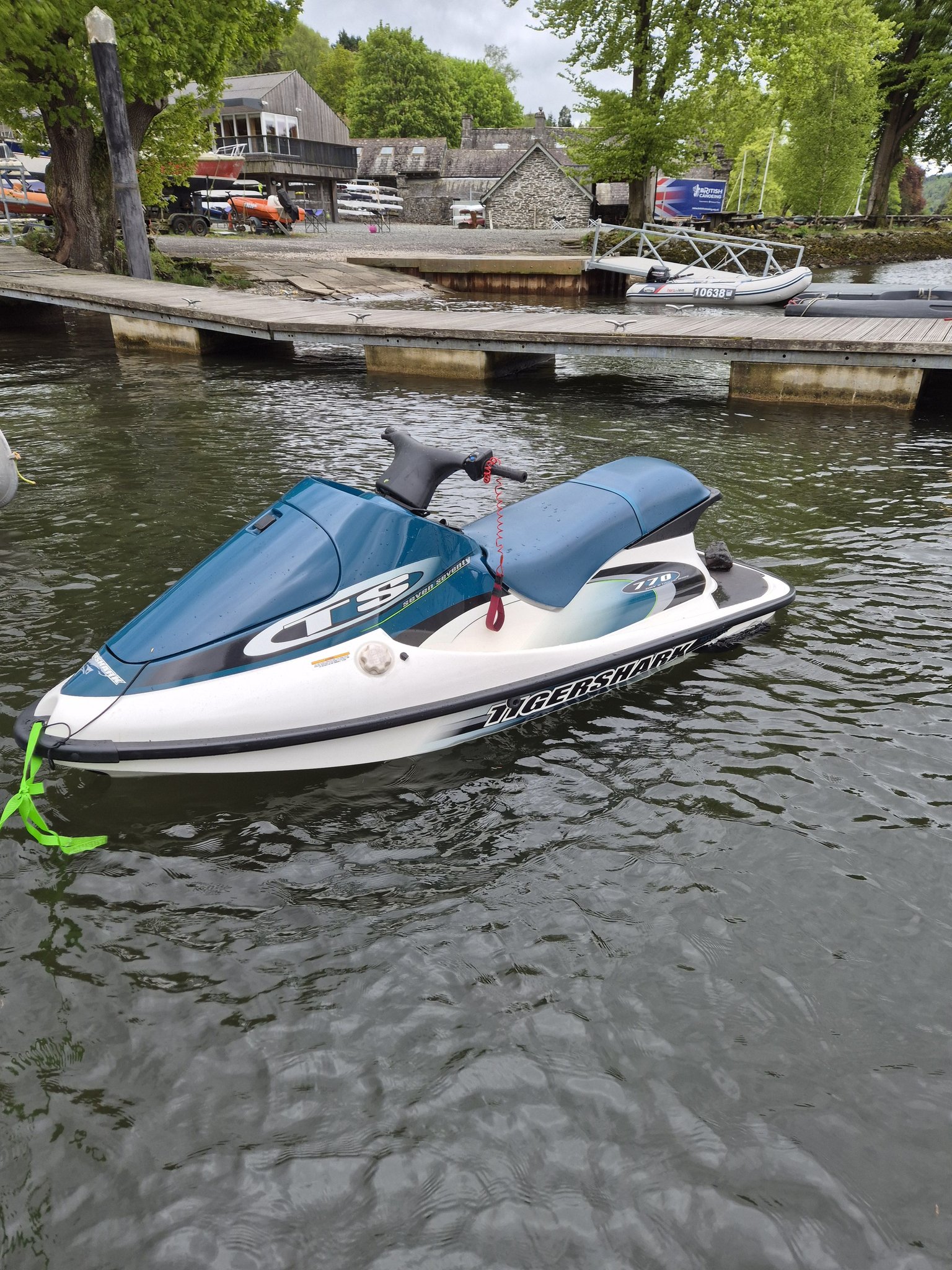 What causes surging at wide open throttle in a 717 Sea-Doo engine?