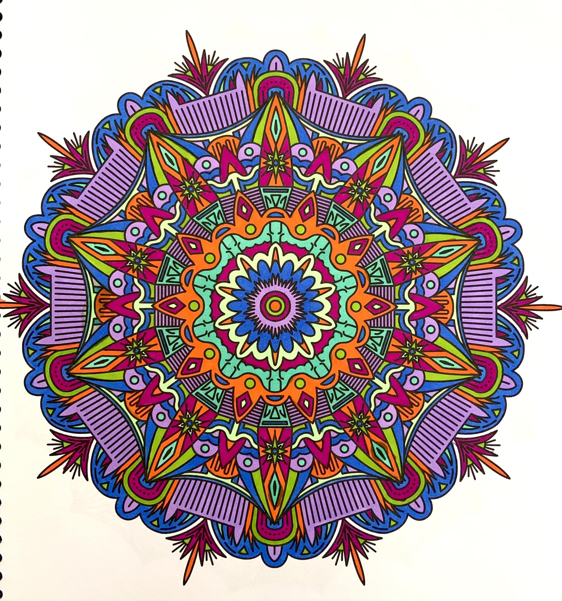 Coloring mandalas in 'I Truncate Mandalas' book with Stabilo pens