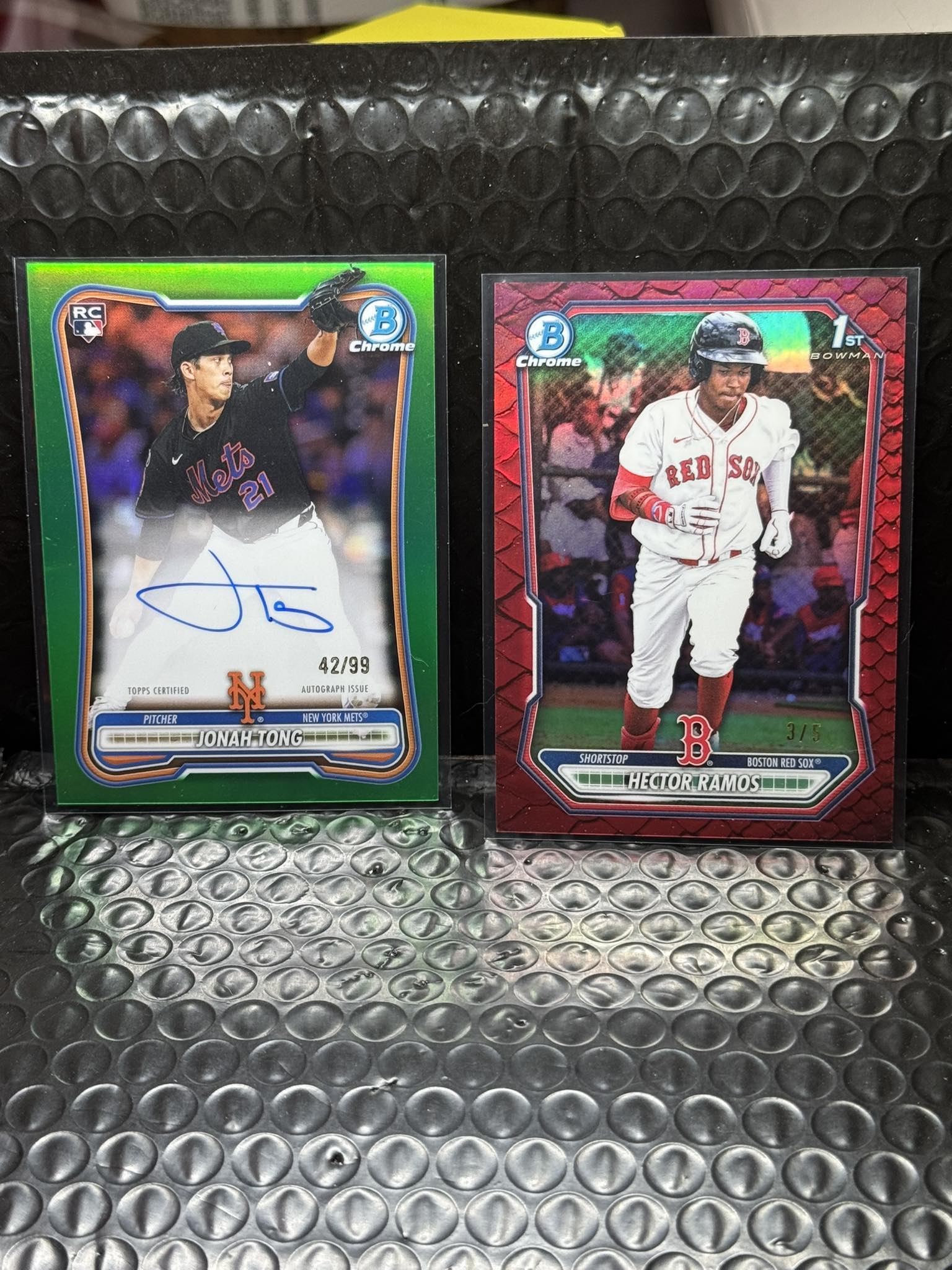 What are the values of Jonah Tong rookie auto and Hector Ramos 1st 