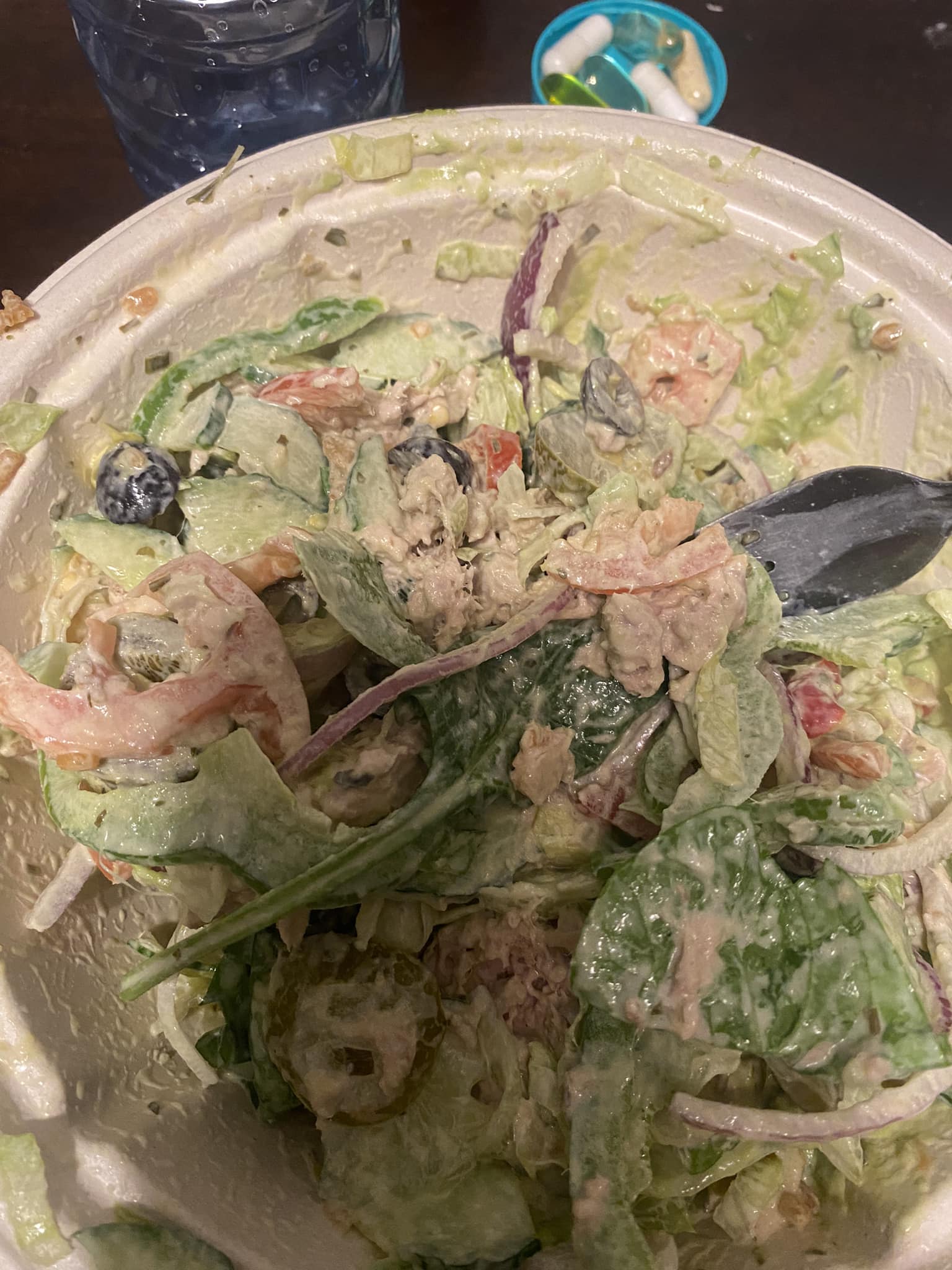 Hubby: what you want from subway Me: All the Veggie salad with avocado 1 small scoop of tuna What I get MESS Swimming in green goddess dressing says woman argued with and