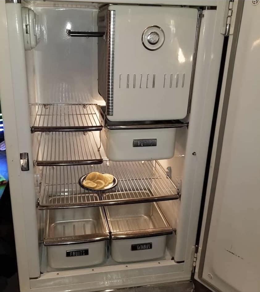 Shopping for a fridge in 1941 Dressed nicely in sensible shoes and