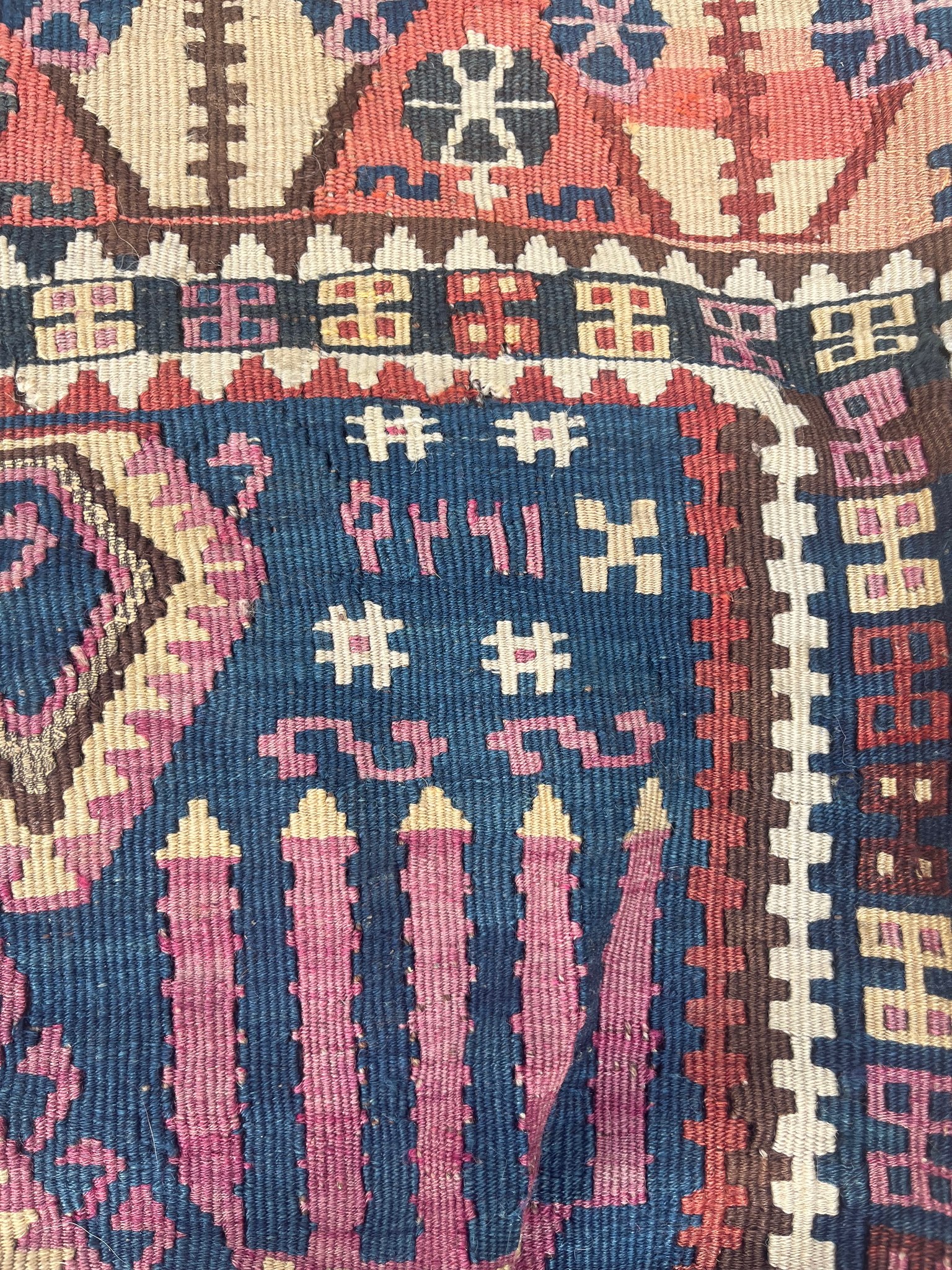 What does the inscription on this prayer kilim mean?