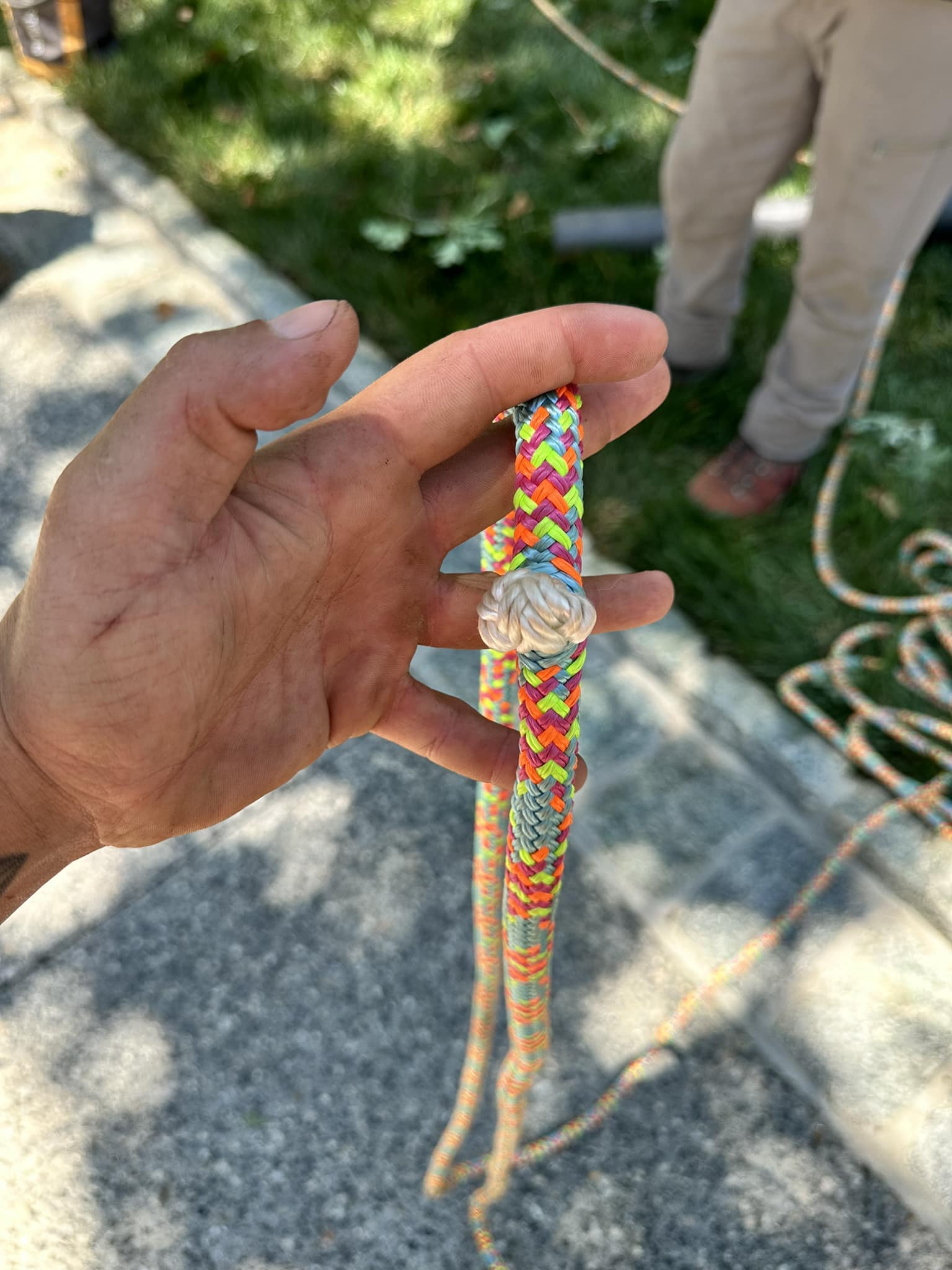How to loop repaired string back to pulley system?