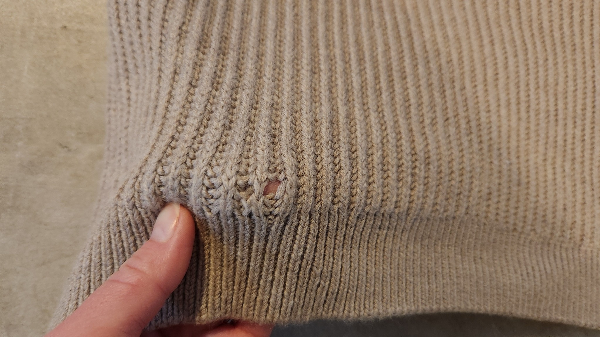 Repairing a Damaged Wool Sweater with Darning and Hair Conditioner