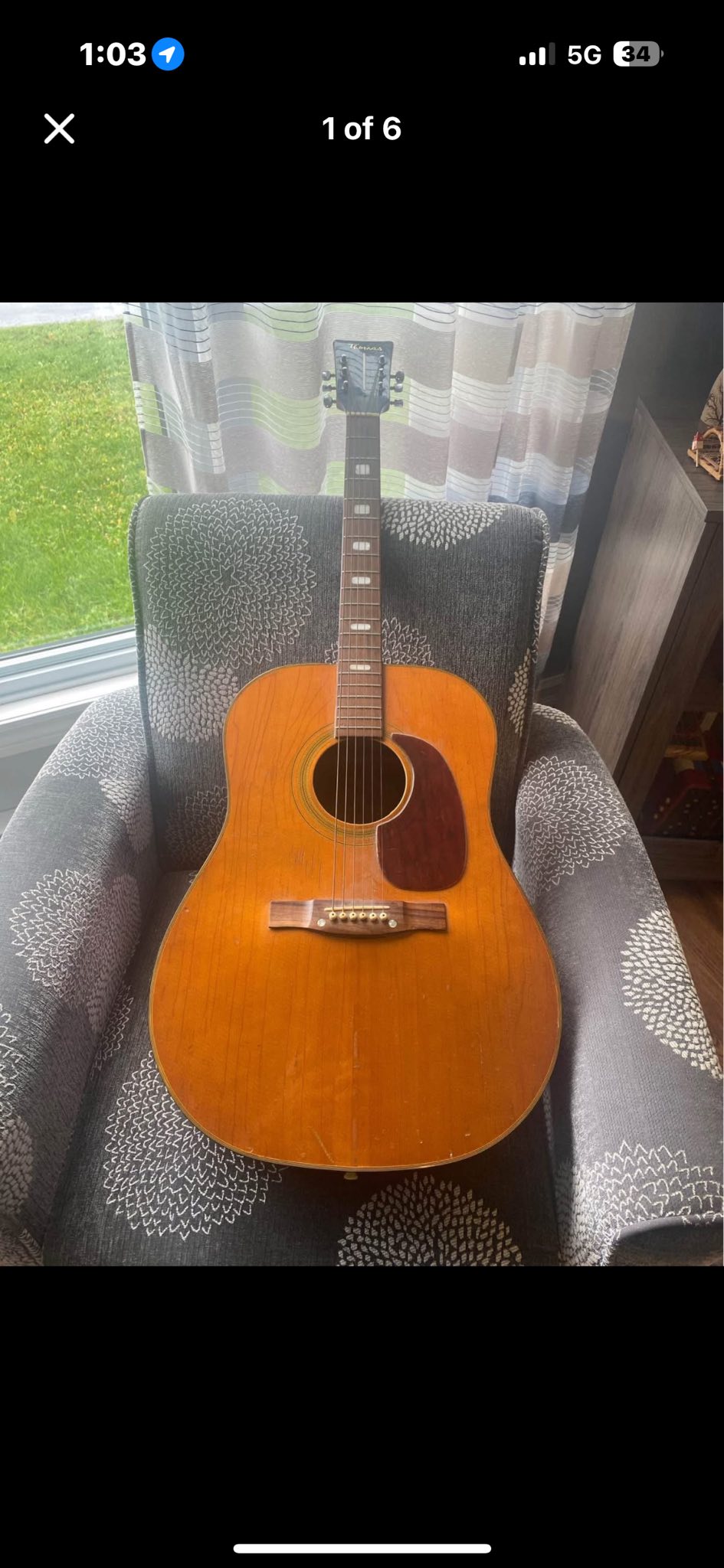What is the value and information of a Thomas guitar?