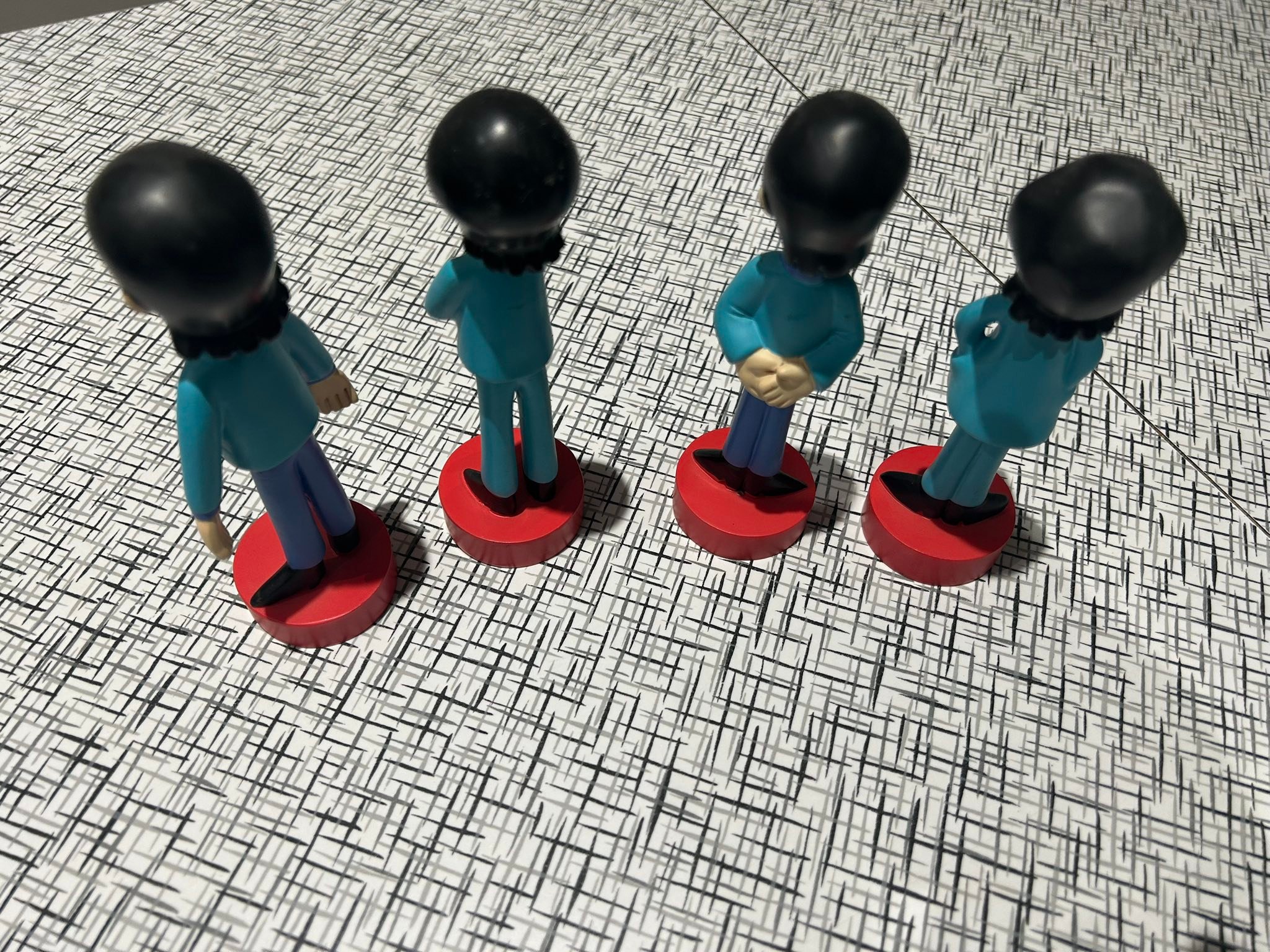 What is the value of a complete set of Beatles statues?