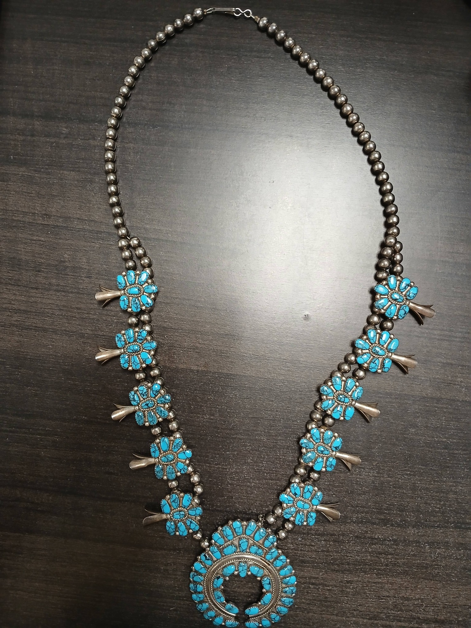 Repair and value of vintage turquoise necklace?