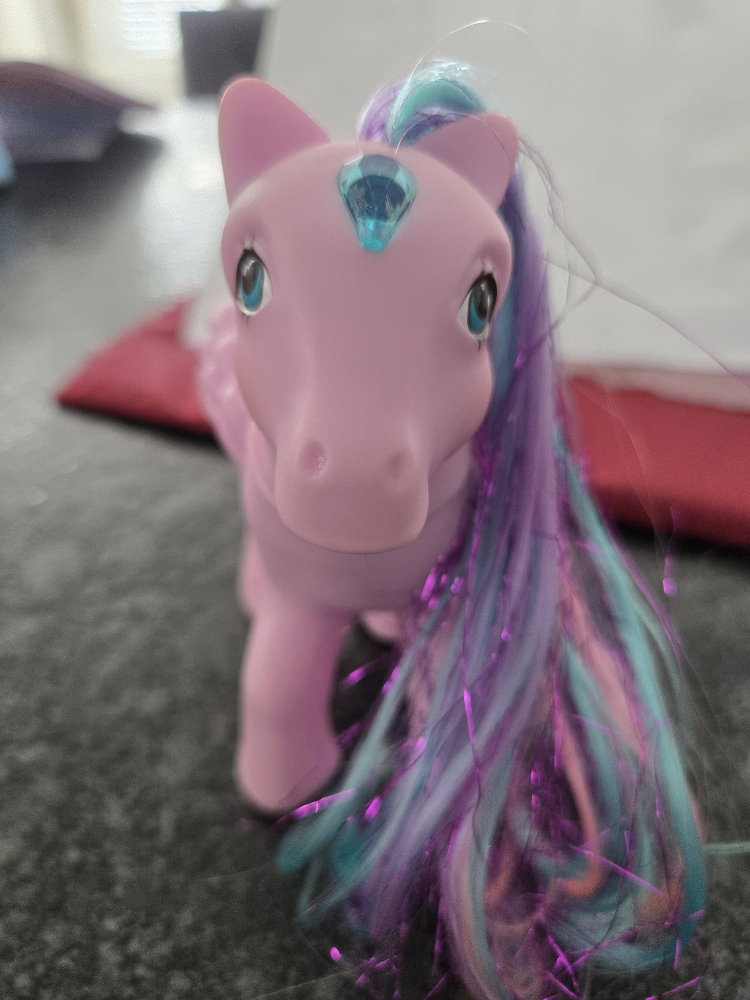 What is the name of this vintage My Little Pony with glitter hair?