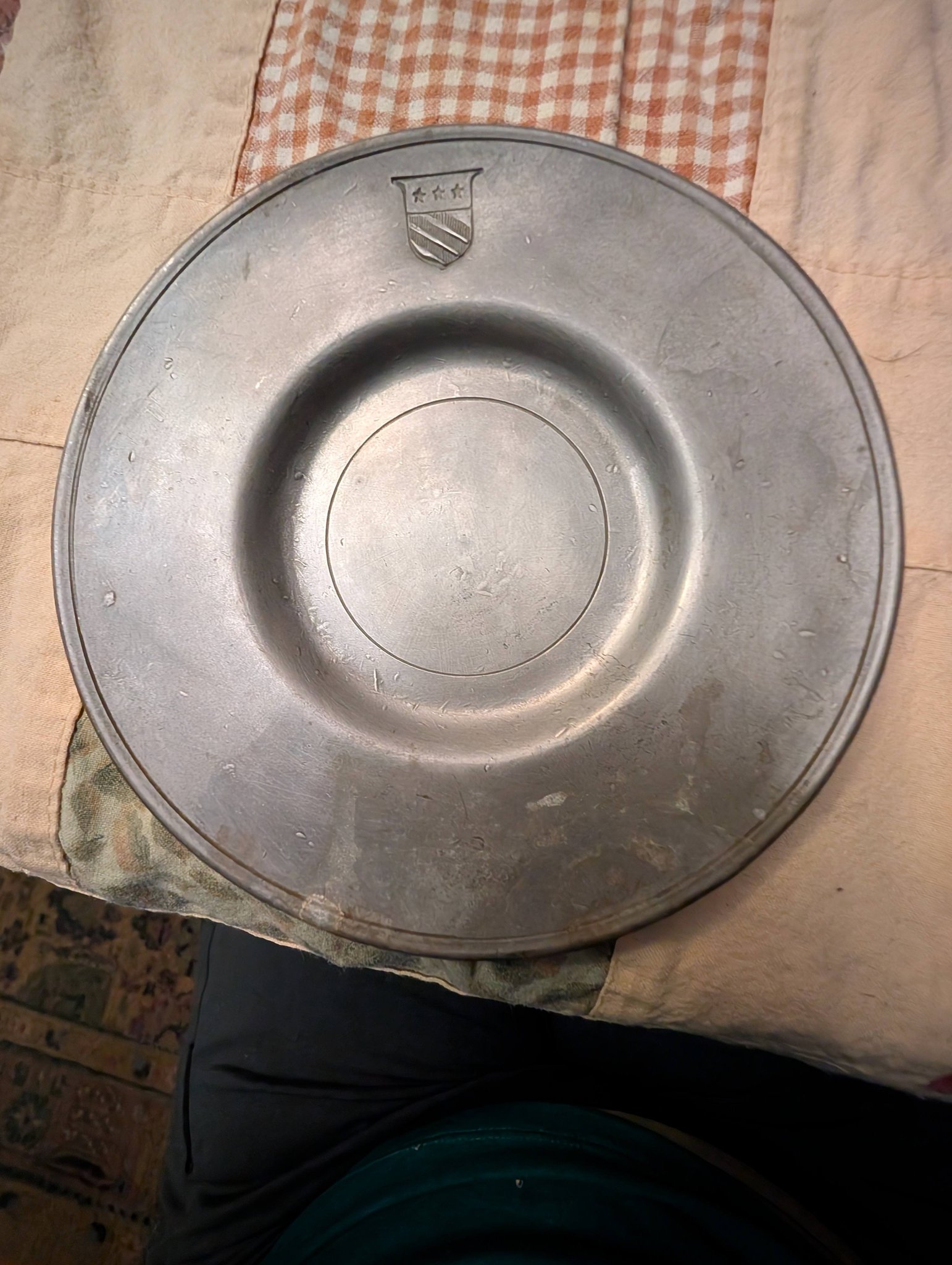 Are plates from Crown Castle Ltd real pewter or an aluminum zinc
