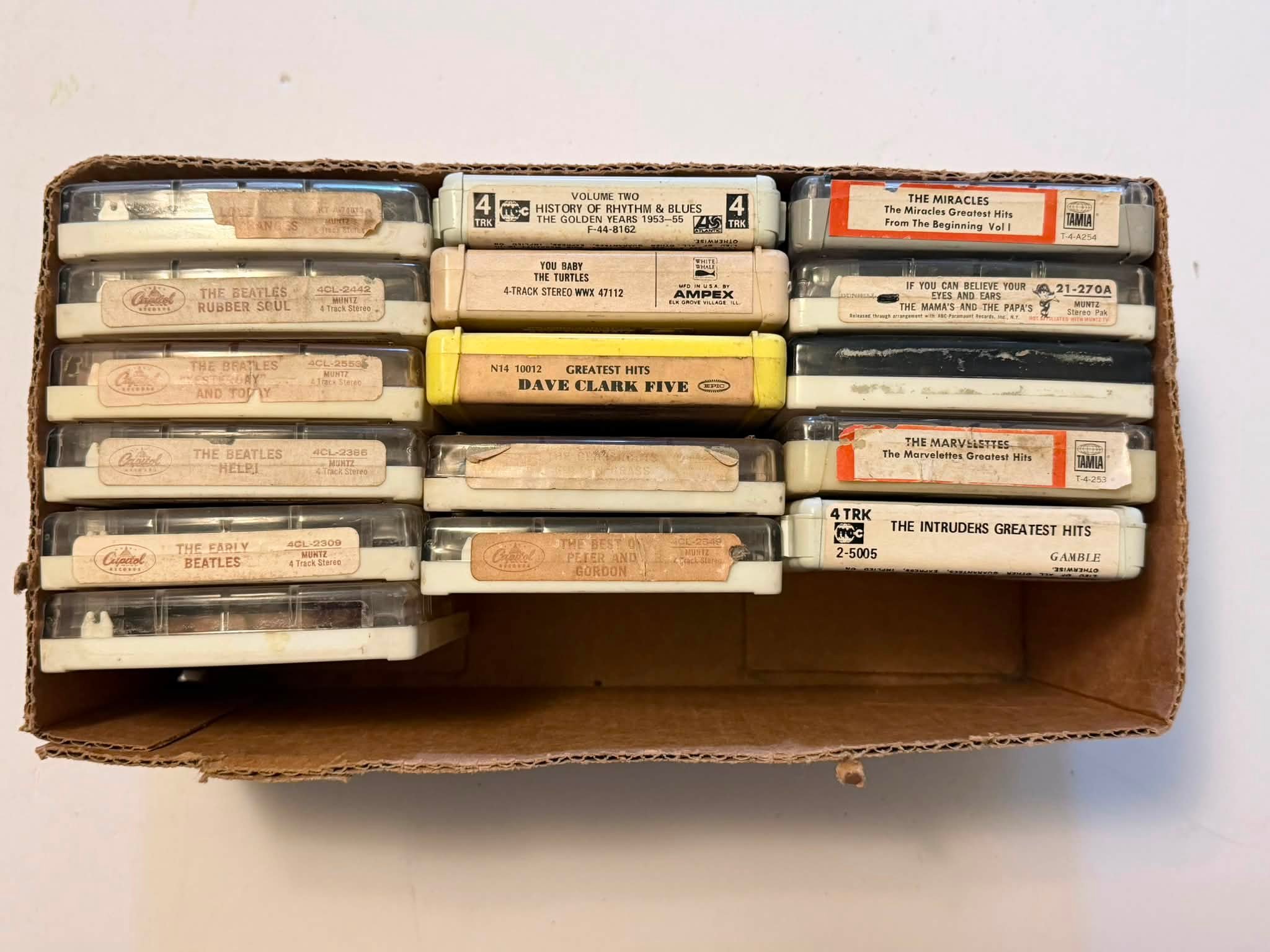 Value and sale of rare 4-track tapes including Beatles and Love