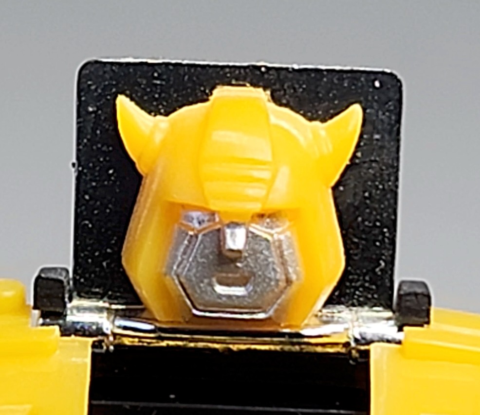 One of these things is not like the other. Early faces of Bumblebee.