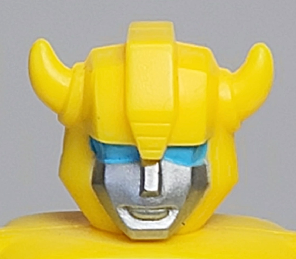 One of these things is not like the other. Early faces of Bumblebee.