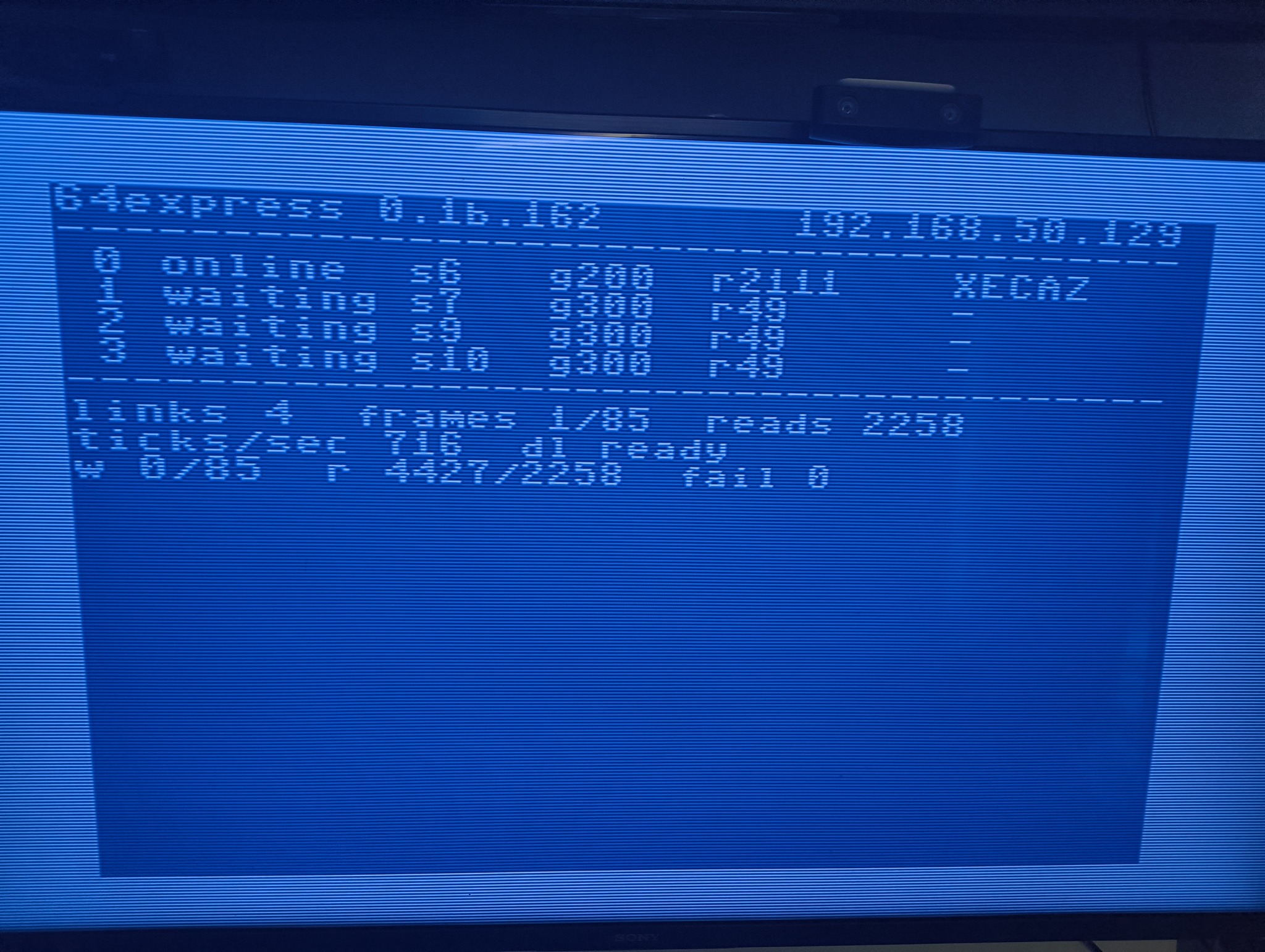 とも Commodore 64 BBS achieves 15kb/s with 4-node setup