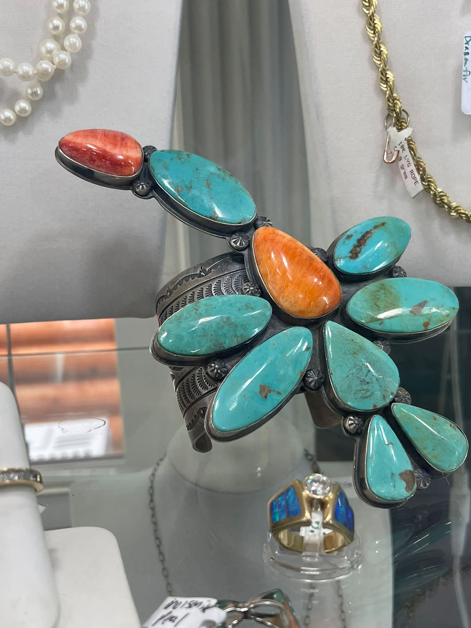 Navajo good luck pendant with snake and rolling-log design
