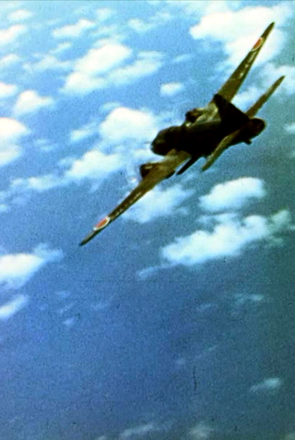 Mitsubishi G4M 'Betty' bomber under attack by F6F Hellcat