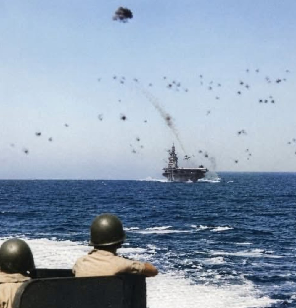 Navy crewmen on the light cruiser USS Nashville (CL-43) are seen