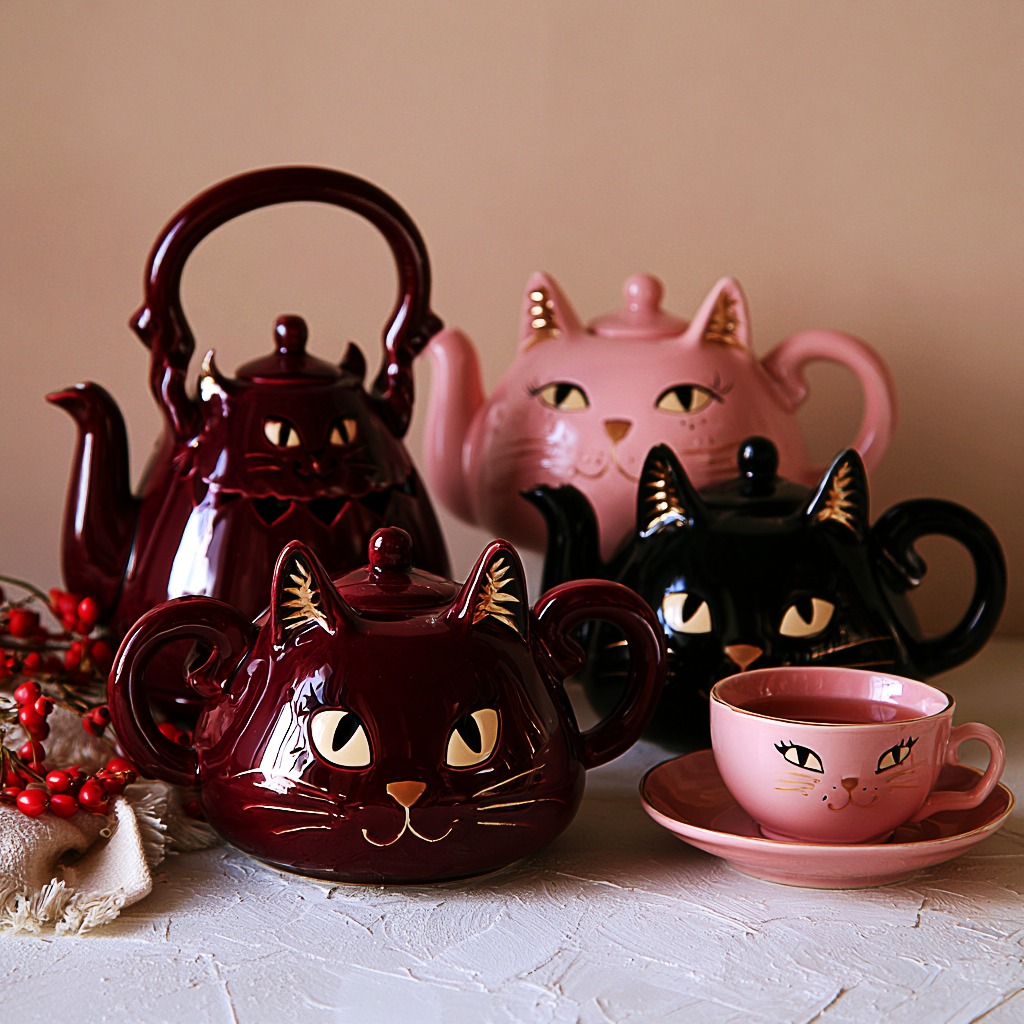Elegant weird cat teapots and cups in deep burgundy, powdery pink