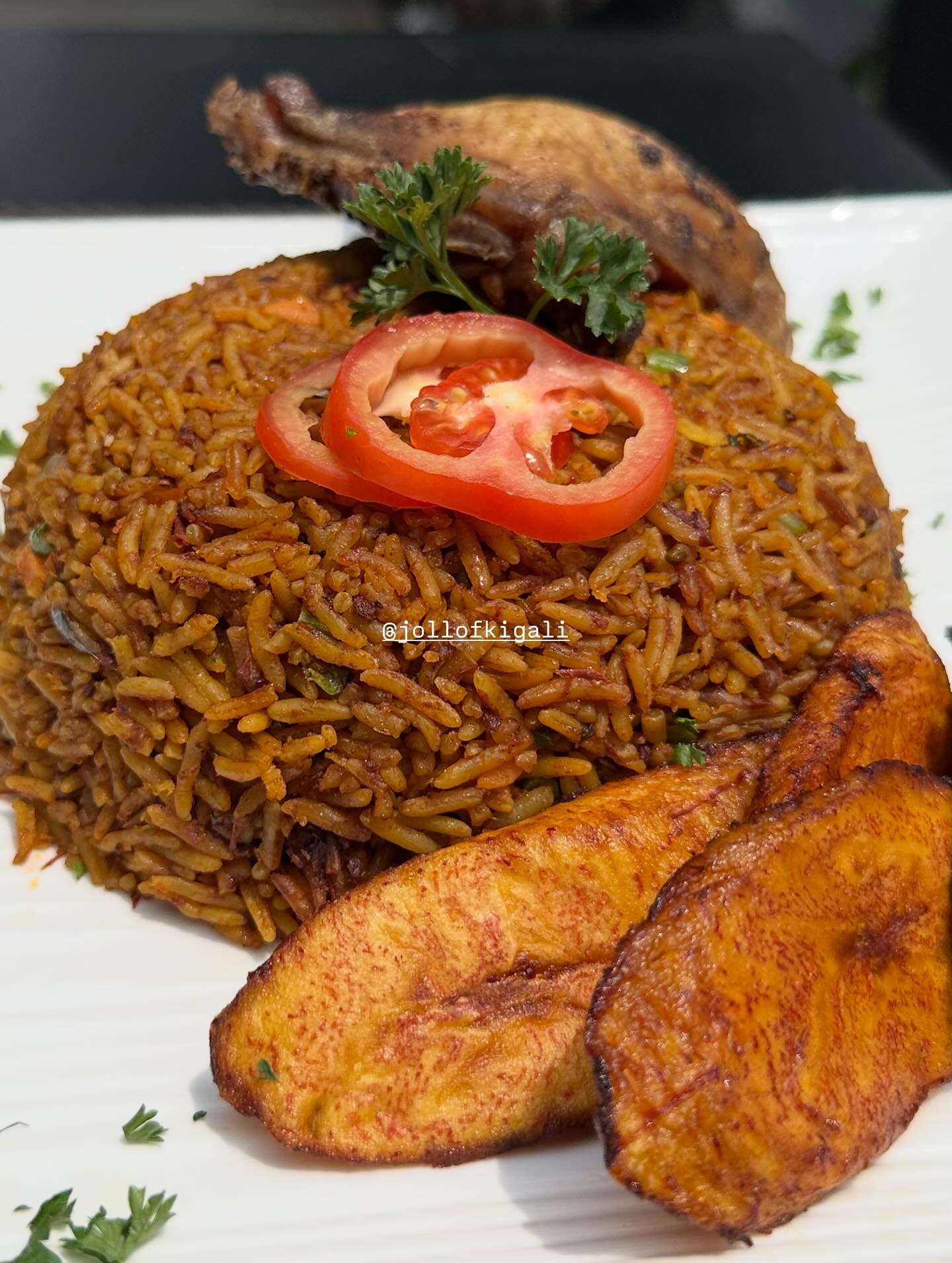 jollof kigali - Barbecue pork ribs/plantain and Jollof rice,have you ...