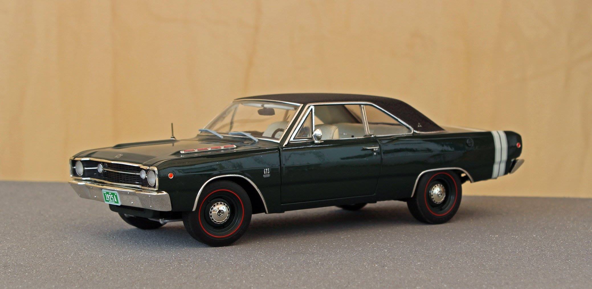 Detailed 1:18 scale die-cast metal model of a 1969 Dodge Dart GTS