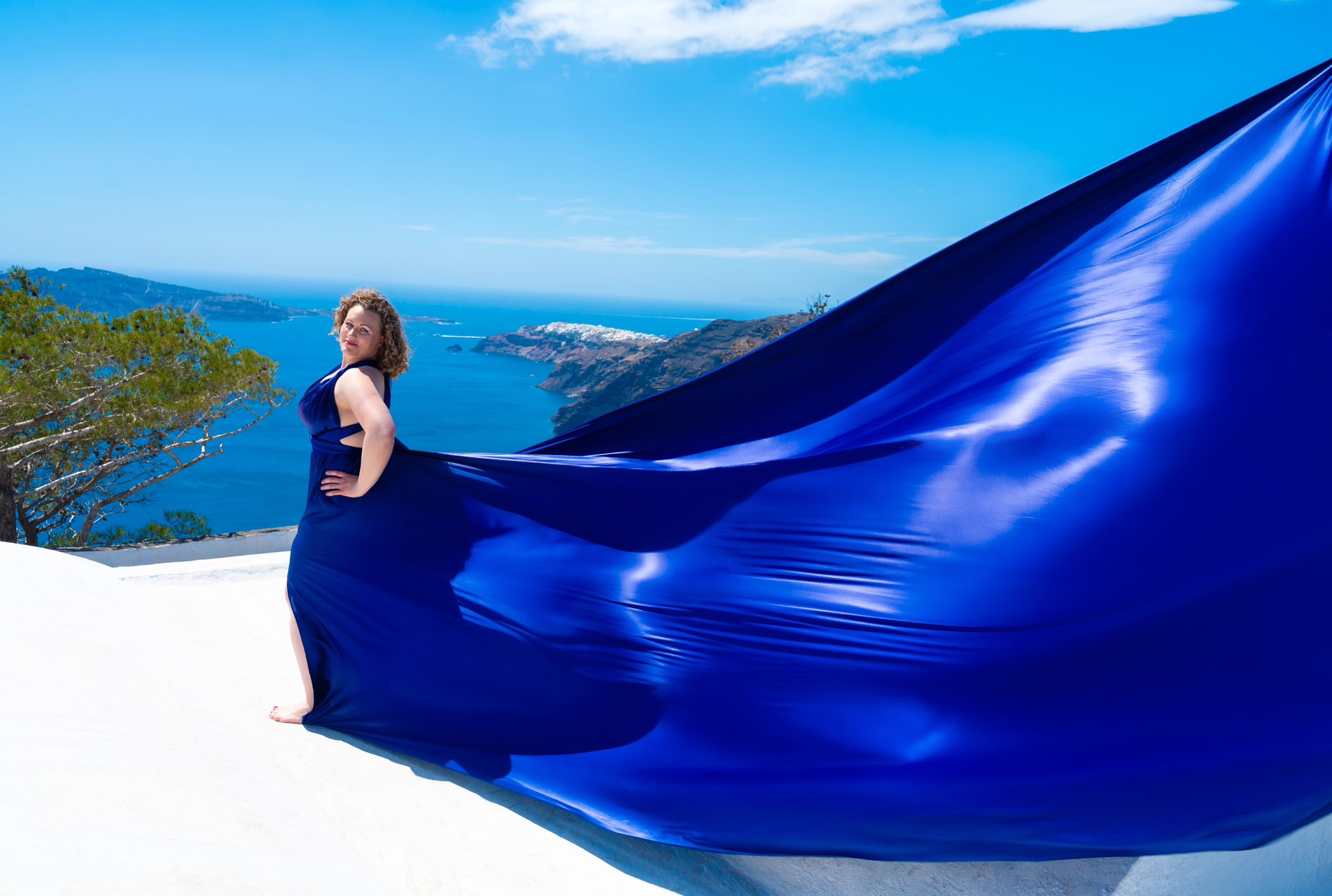comment on blue dress More “fly dress” photos from Santorini with all the lovely ladies that accompanied me. I'll tag the photographer in the comments if you're interested! ￼ blue dress captions for instagram