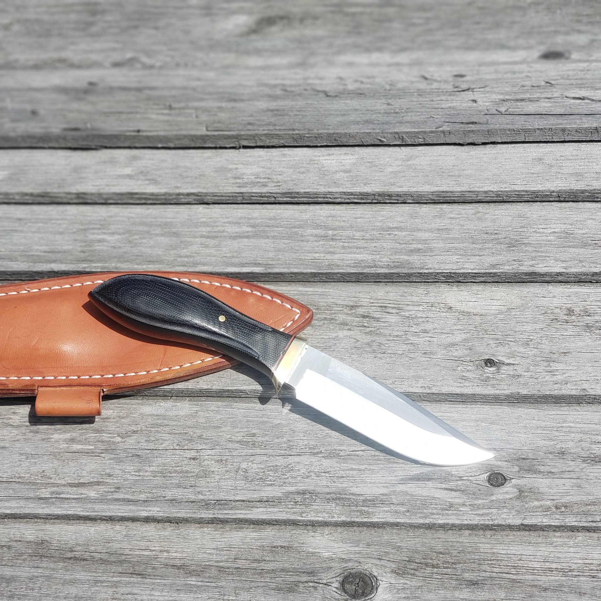 Are Jesse Hemphill knives made by Bark River?