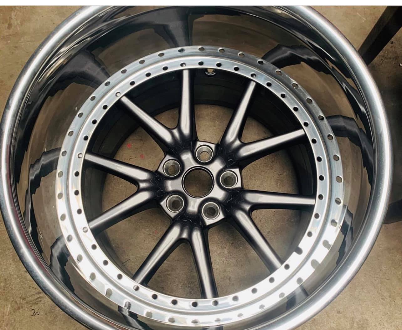 Tesla Model 3 with 18x11.5 drift spares on Toyota Cressida and