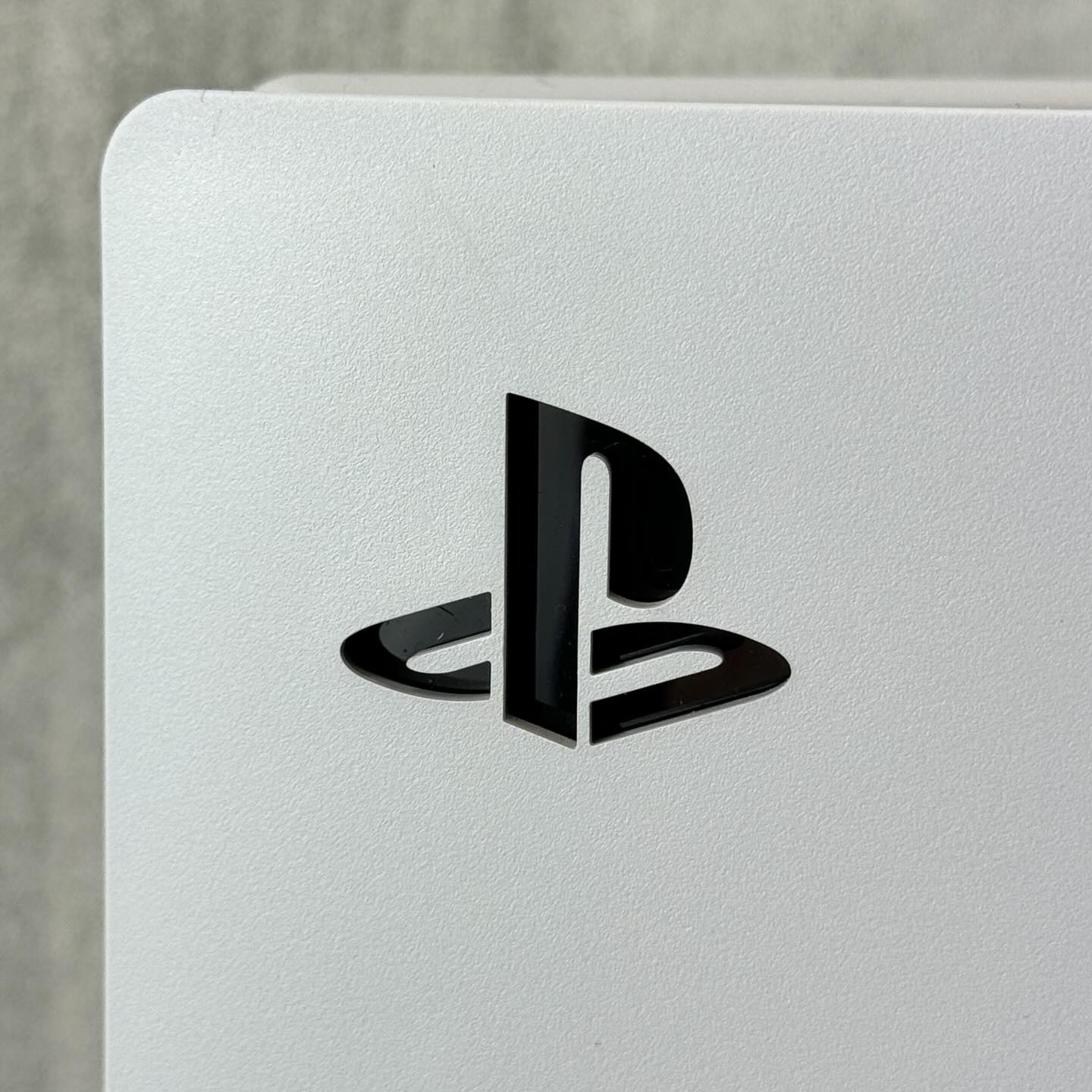 Calatech - The little PlayStation logos on the inside of...