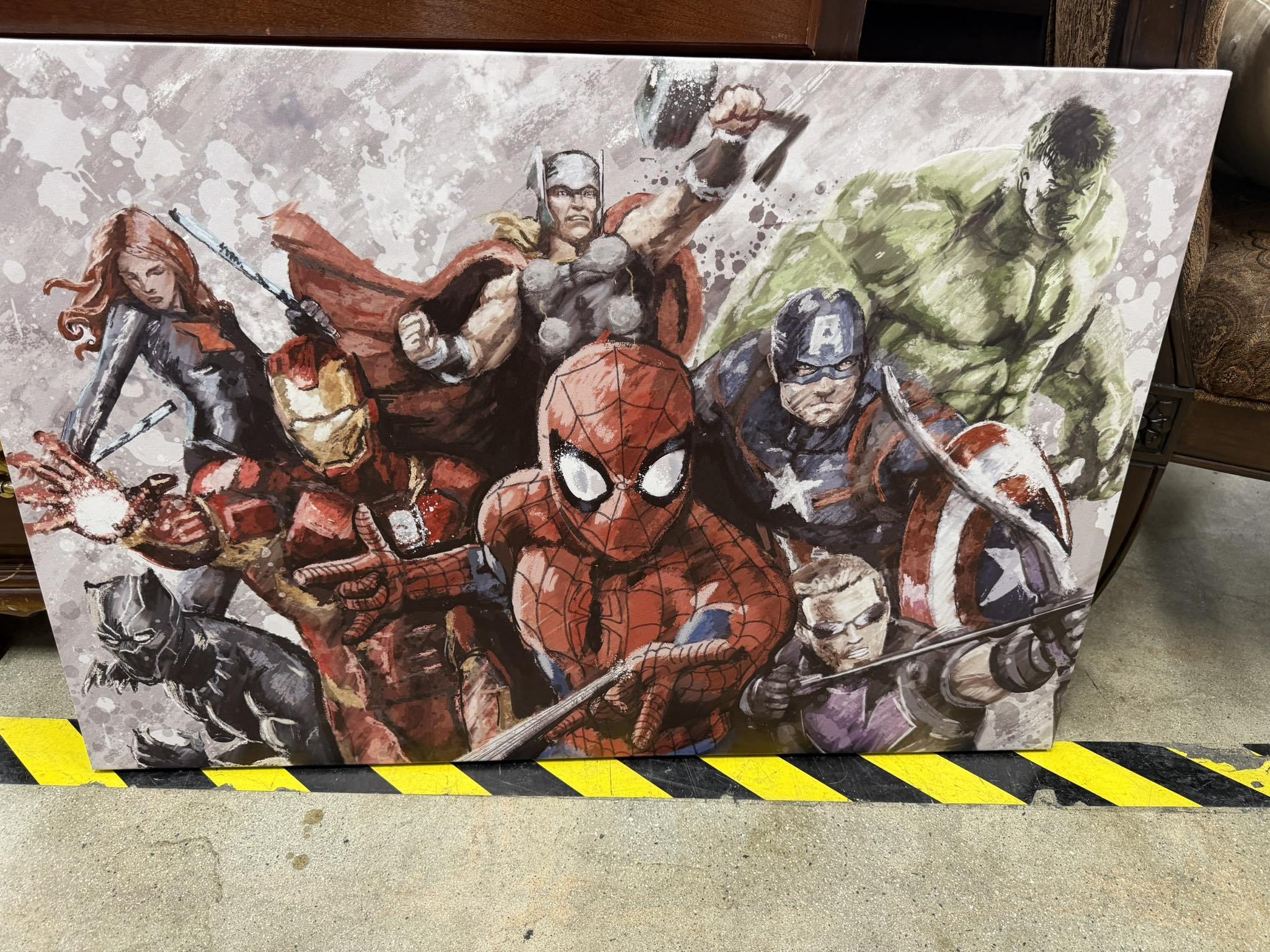 Black-framed Marvel Avengers wall art features a comic book style