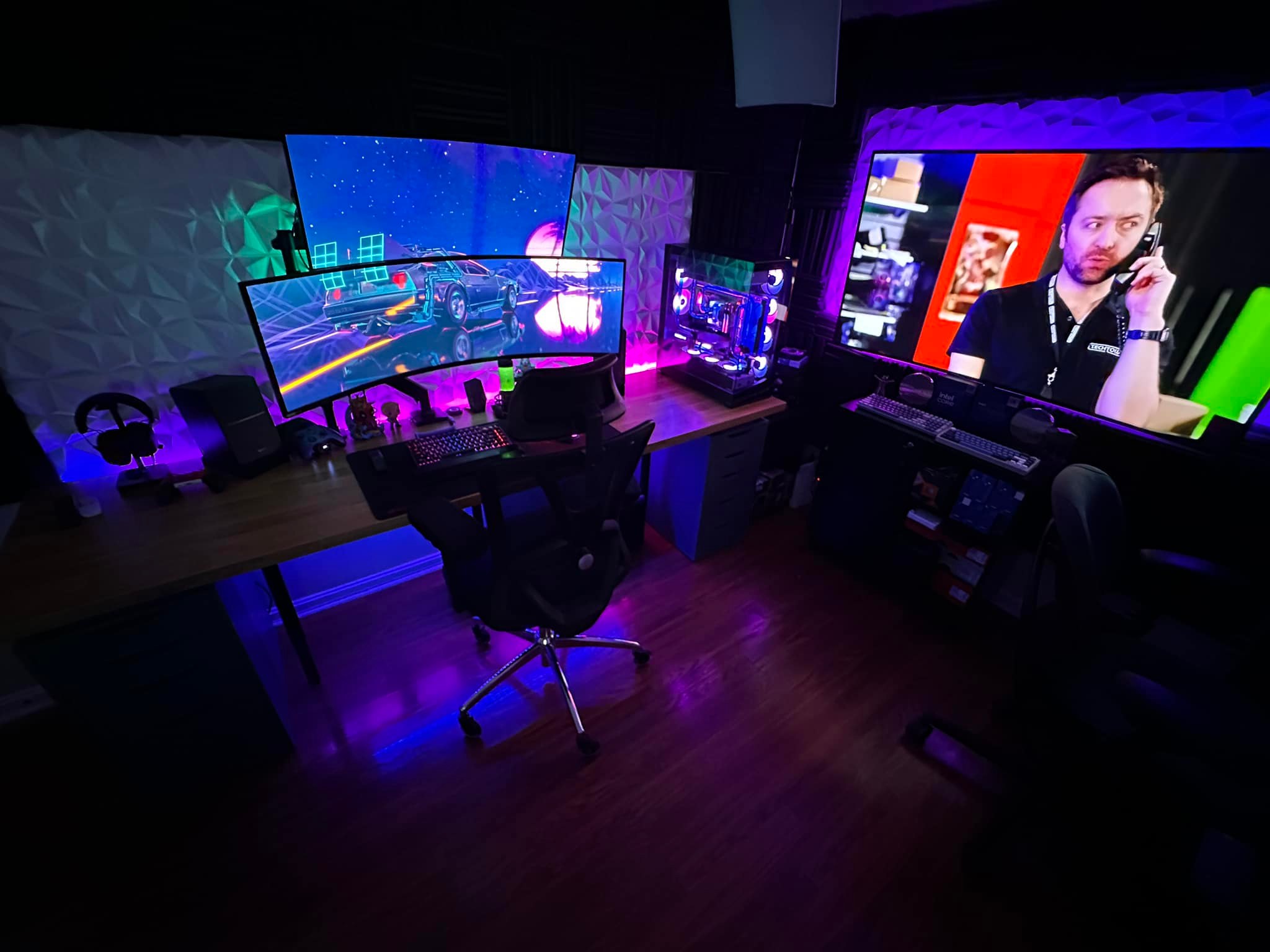 Home office setup with ThinkVision screens and custom PC