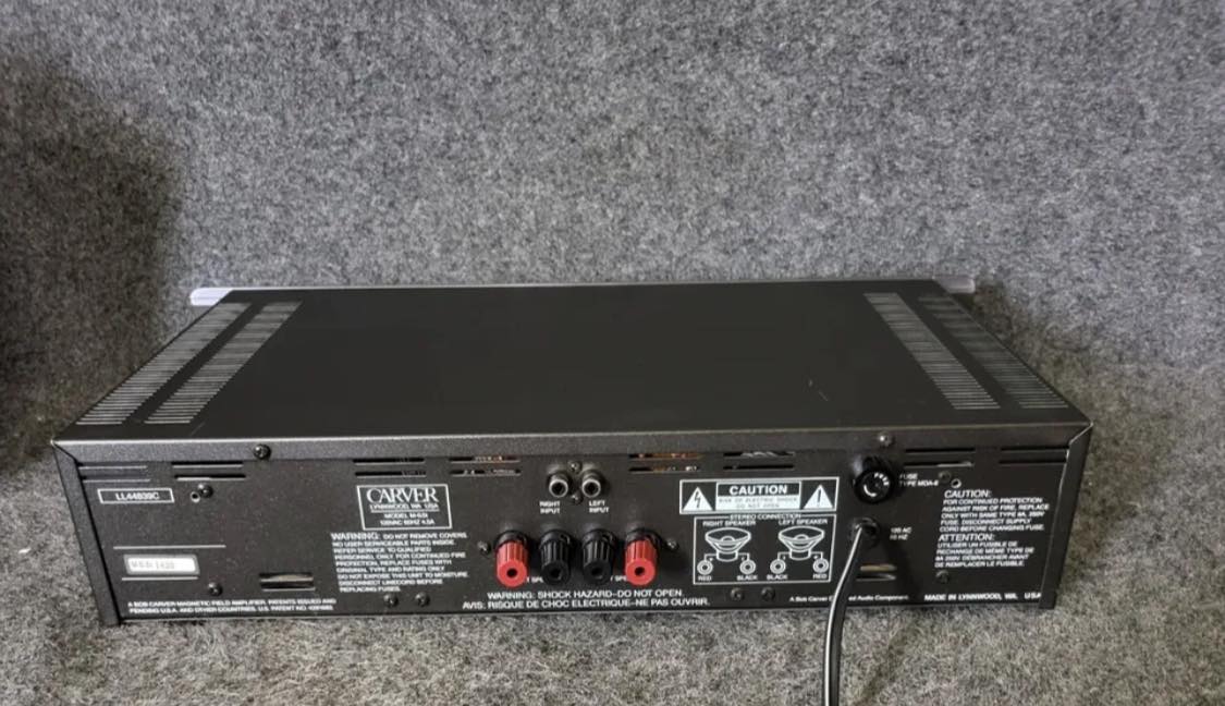 My Carver PM950 amplifier 2x475 watt 4 ohms, 2x325watt 8 ohms.