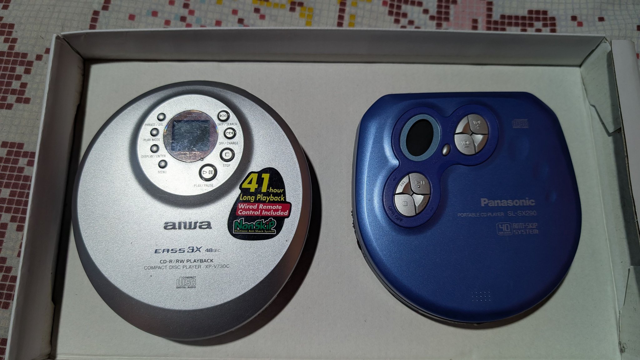 My 2 most favourite personal CD players side by side: - AIWA XP