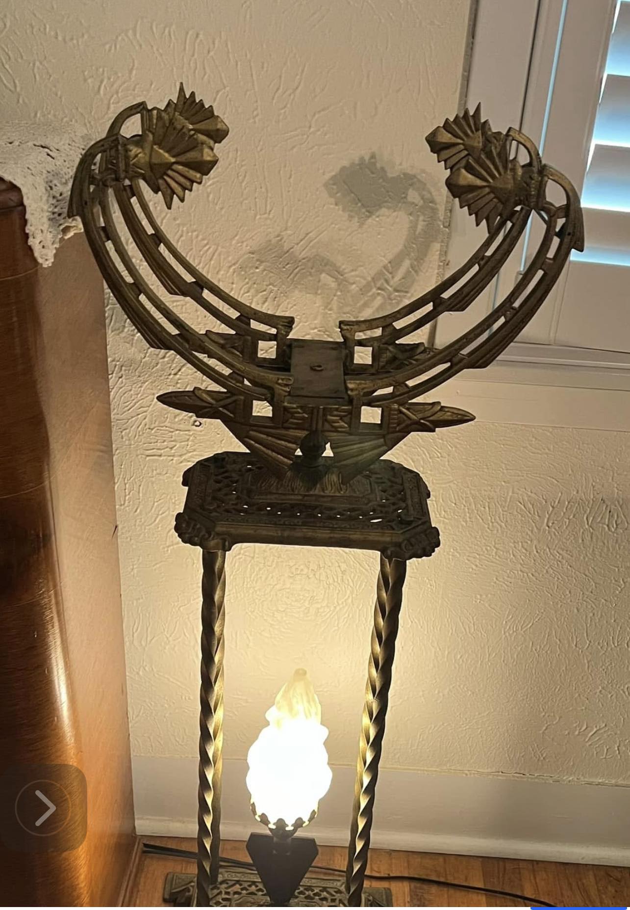 What is the value of a 1920s art deco solid brass fish bowl?