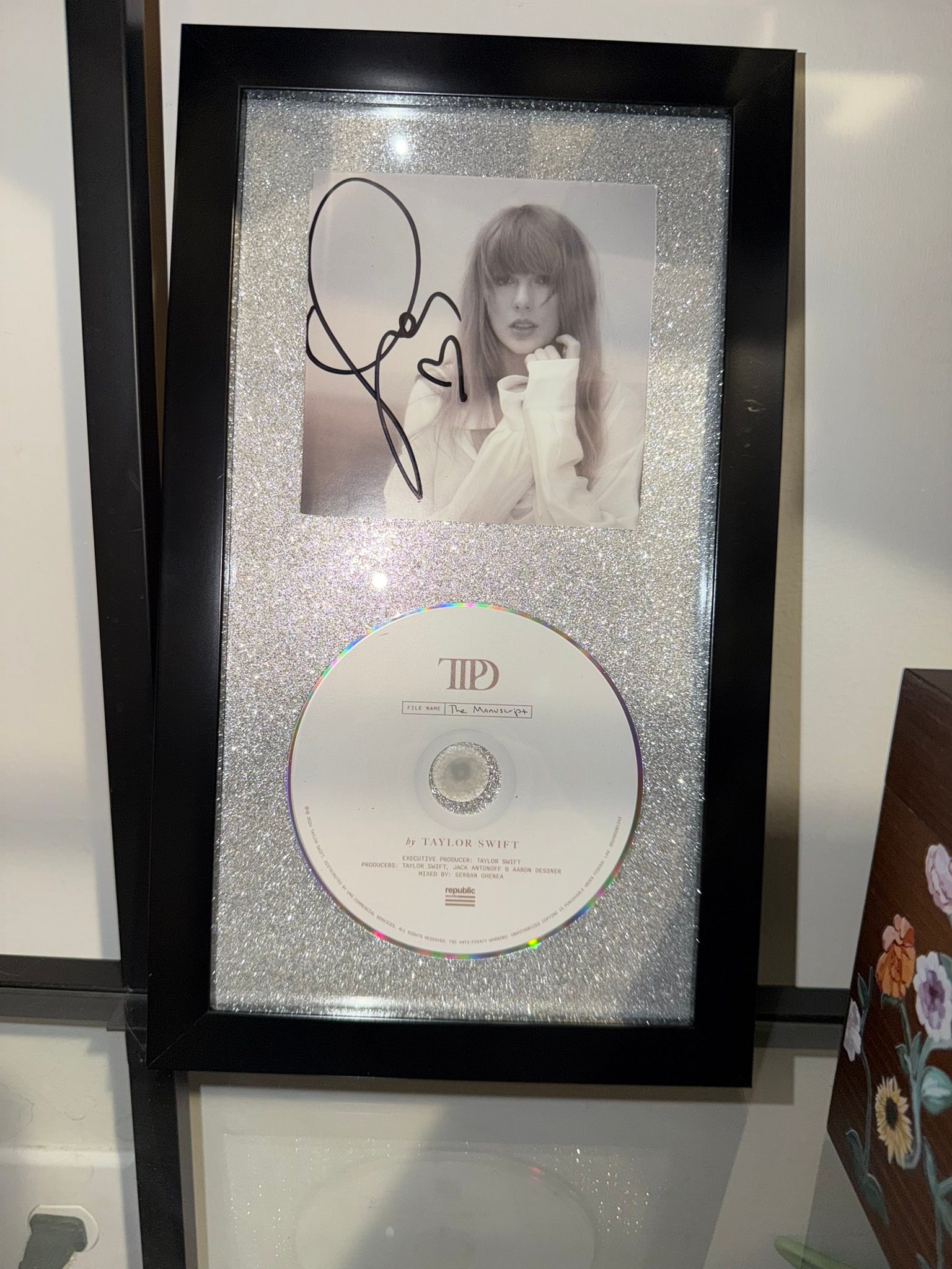Framed Taylor Swift's signed TLOAS set with glitter