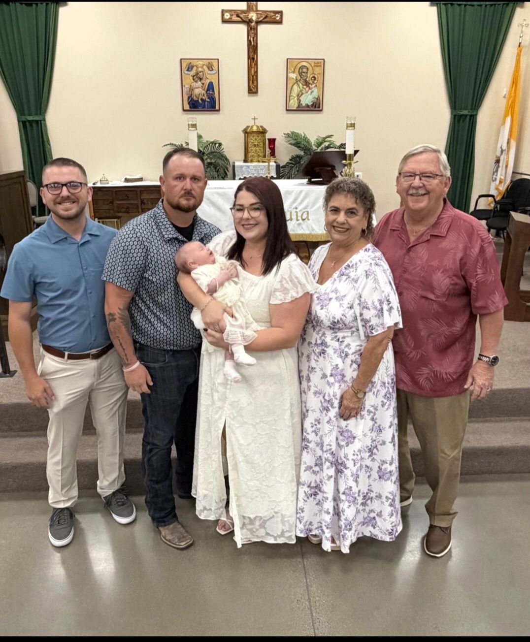 Family celebrates granddaughter's baptism at St. Michael the